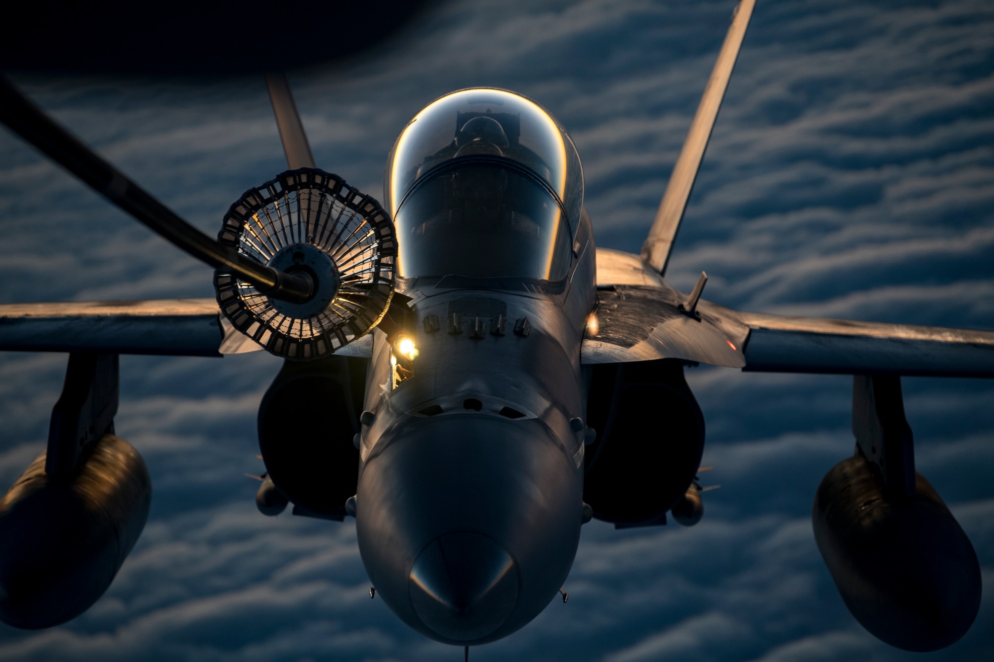 A U.S. Marine Corps F/A-18 Hornet assigned to Marine Fighter Attack Squadron (VMFA) 251 receives fuel from a U.S. Air Force KC-10 Extender assigned to the 908th Expeditionary Air Refueling Squadron above the U.S. Central Command area of responsibility, Jan. 22, 2020.