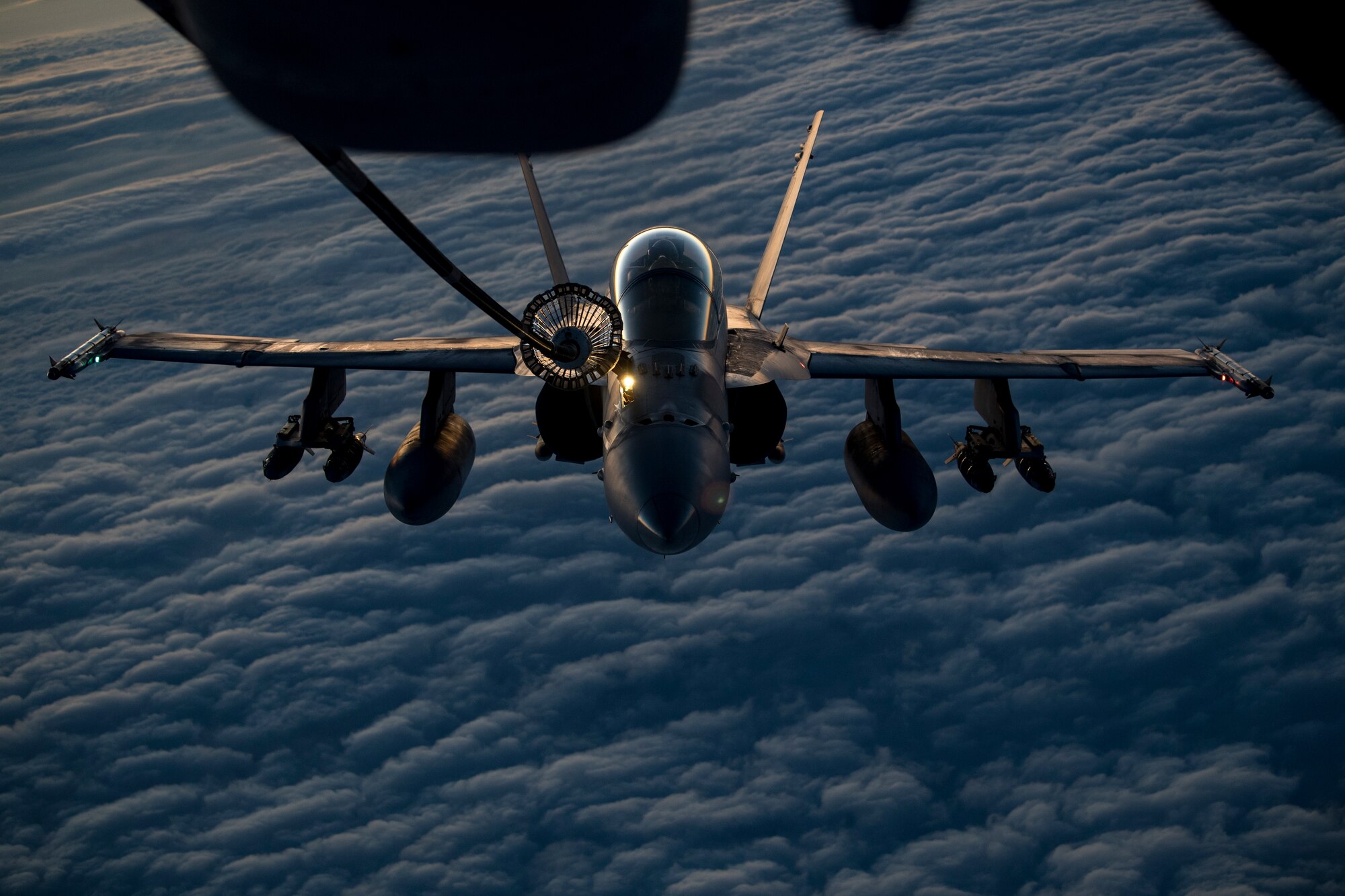 A U.S. Marine Corps F/A-18 Hornet assigned to Marine Fighter Attack Squadron (VMFA) 251 receives fuel from a U.S. Air Force KC-10 Extender assigned to the 908th Expeditionary Air Refueling Squadron above the U.S. Central Command area of responsibility, Jan. 22, 2020.