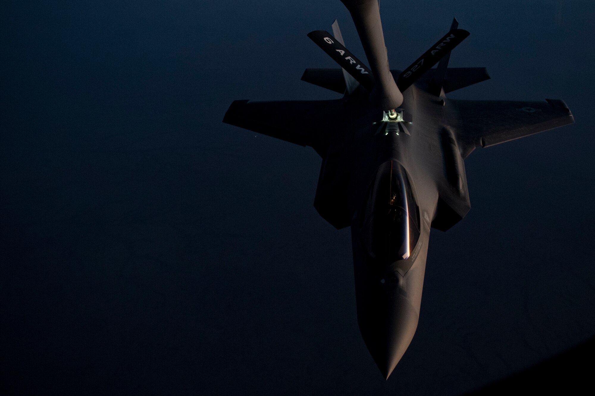 A U.S. Air Force KC-135 Stratotanker assigned to the 28th Expeditionary Air Refueling Squadron refuels a U.S. Air Force F-35A Lightning II assigned to the 34th Expeditionary Fighter Squadron in the U.S. Central Command area of operation, Jan. 3, 2020.