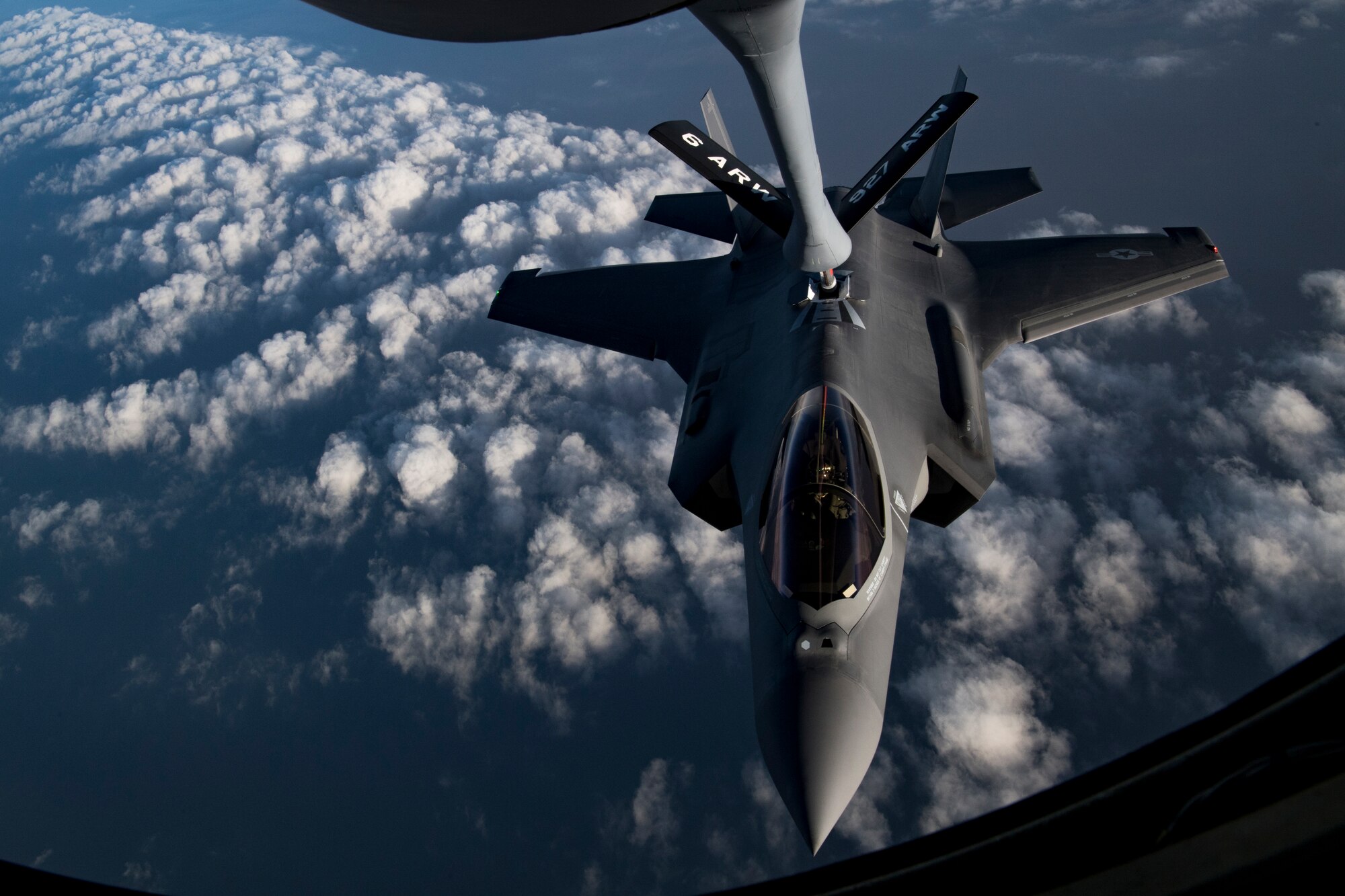 A U.S. Air Force KC-135 Stratotanker assigned to the 28th Expeditionary Air Refueling Squadron refuels a U.S. Air Force F-35A Lightning II assigned to the 34th Expeditionary Fighter Squadron in the U.S. Central Command area of operation, Jan. 3, 2020.