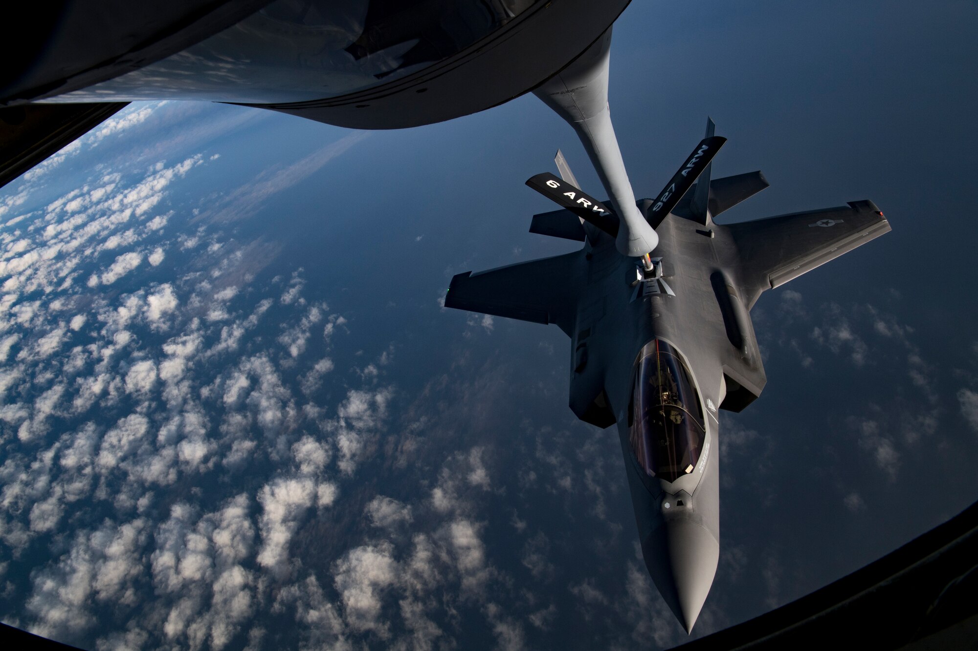 A U.S. Air Force KC-135 Stratotanker assigned to the 28th Expeditionary Air Refueling Squadron refuels a U.S. Air Force F-35A Lightning II assigned to the 34th Expeditionary Fighter Squadron in the U.S. Central Command area of operation, Jan. 3, 2020.