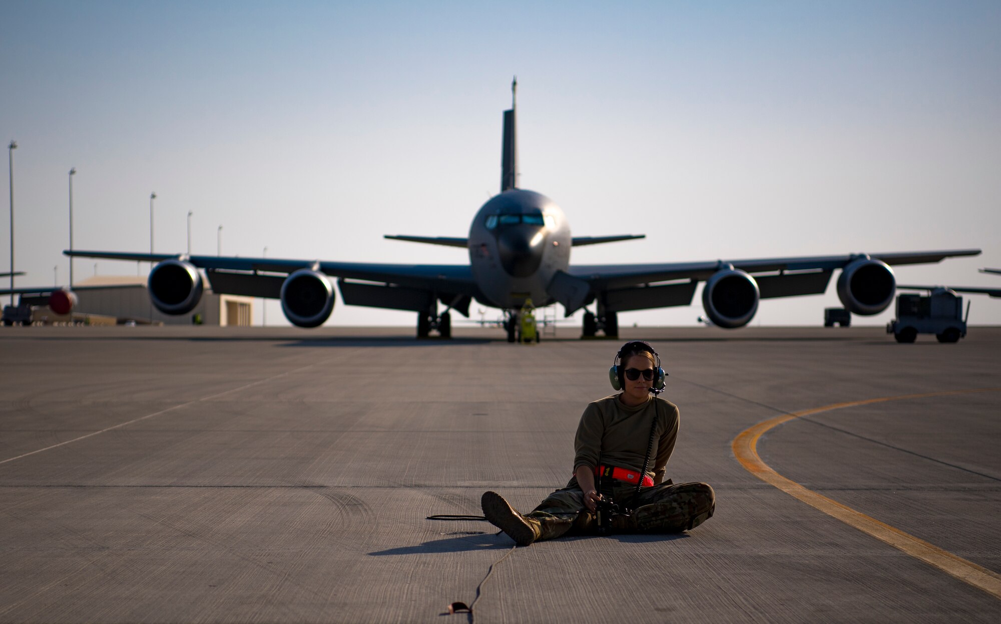 A U.S. Air Force KC-135 Stratotanker Crew chief assigned to the 385th Expeditionary Aircraft Maintenance Squadron waits to begin a preflight inspection at Al Udeid Air Base, Qatar, Jan. 3, 2020.