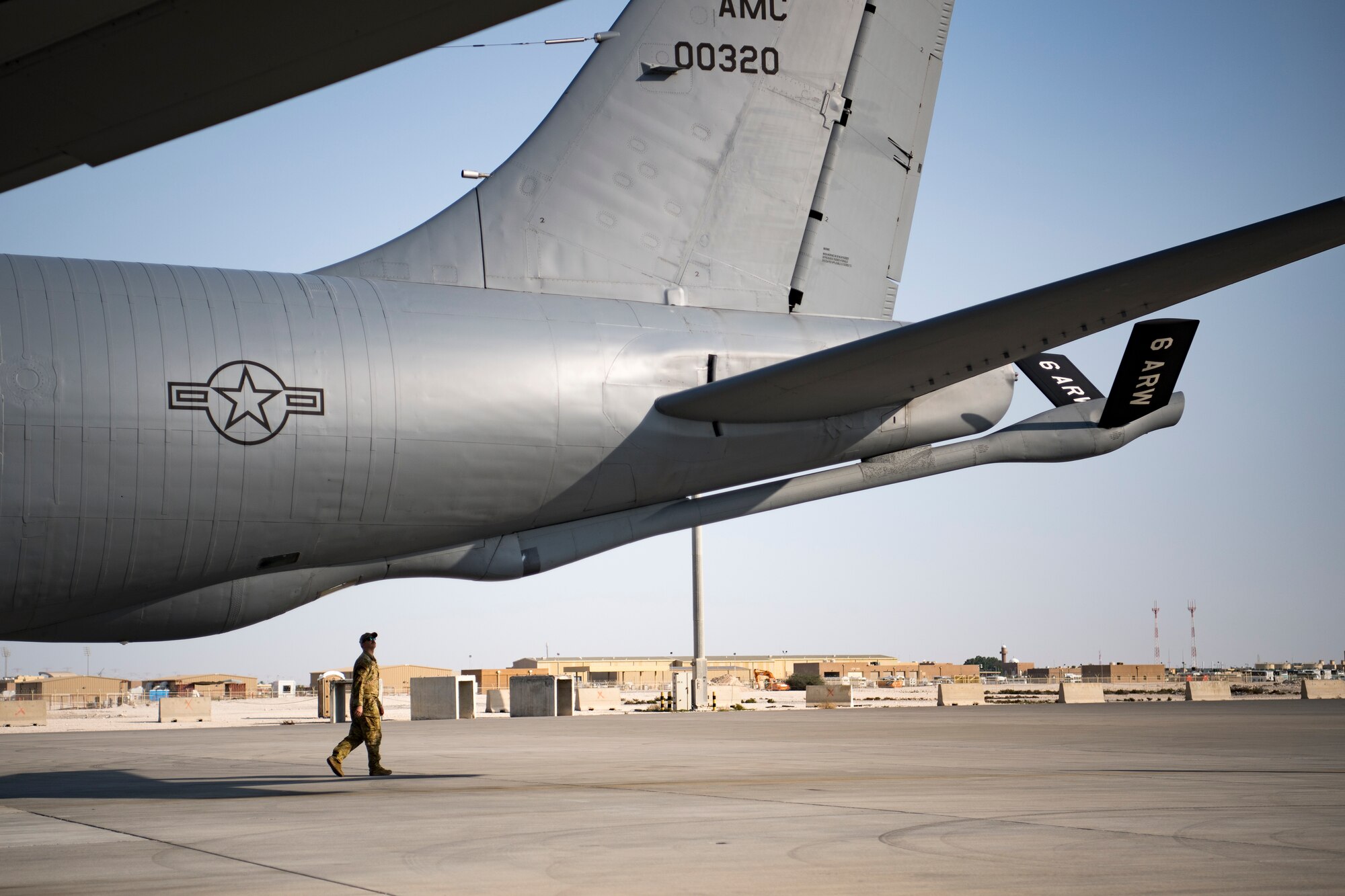 A U.S. Air Force KC-135 Stratotanker pilot assigned to the 28th Expeditionary Air Refueling Squadron conducts a preflight inspection at Al Udeid Air Base, Qatar, Jan. 3, 2020.