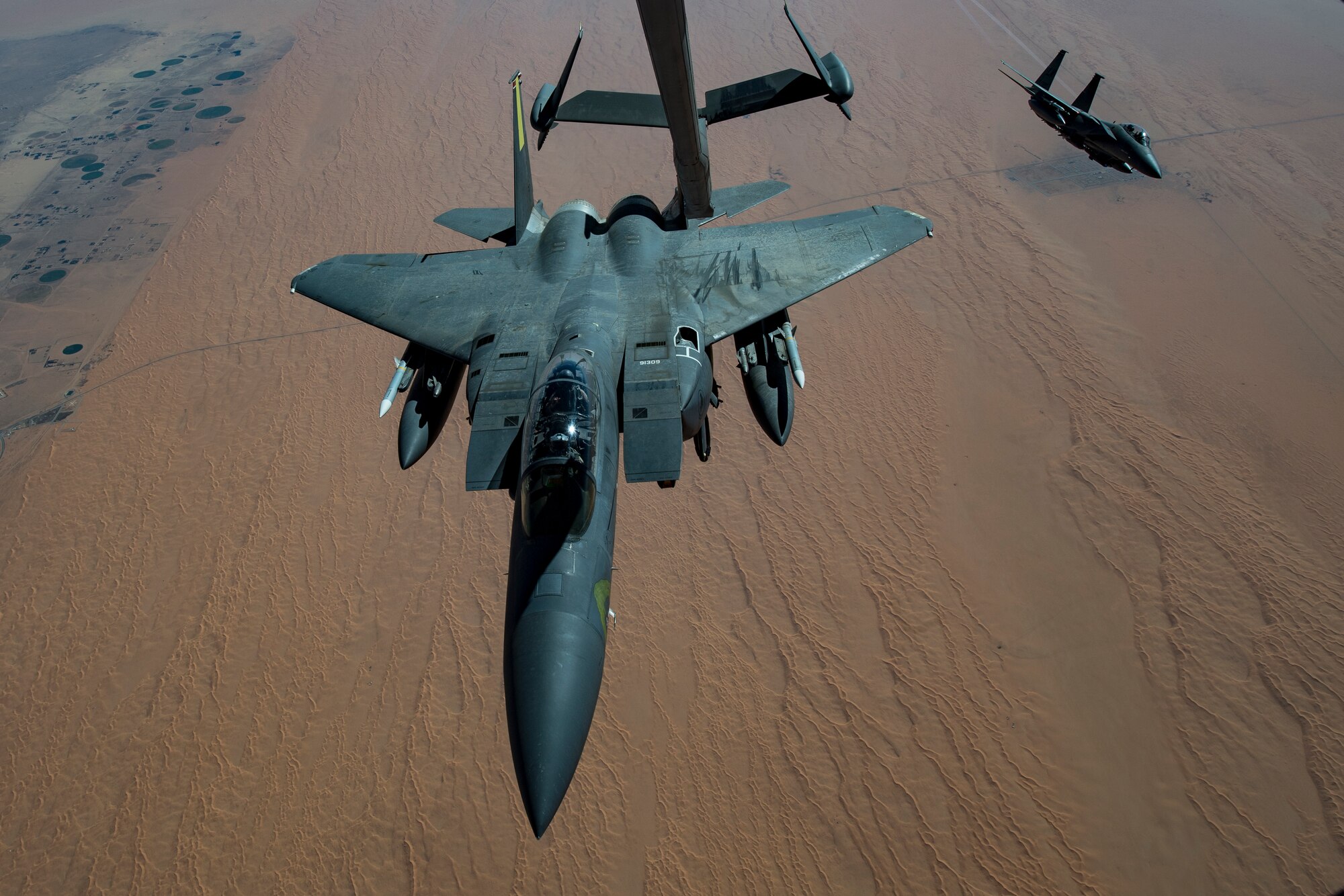 A U.S. Air Force F-15E Strike Eagle assigned to the 494th Expeditionary Fighter Squadron departs a U.S. Air Force KC-10 Extender assigned to the 908th Expeditionary Air Refueling Squadron above the U.S. Central Command area of responsibility, Jan. 15, 2020.