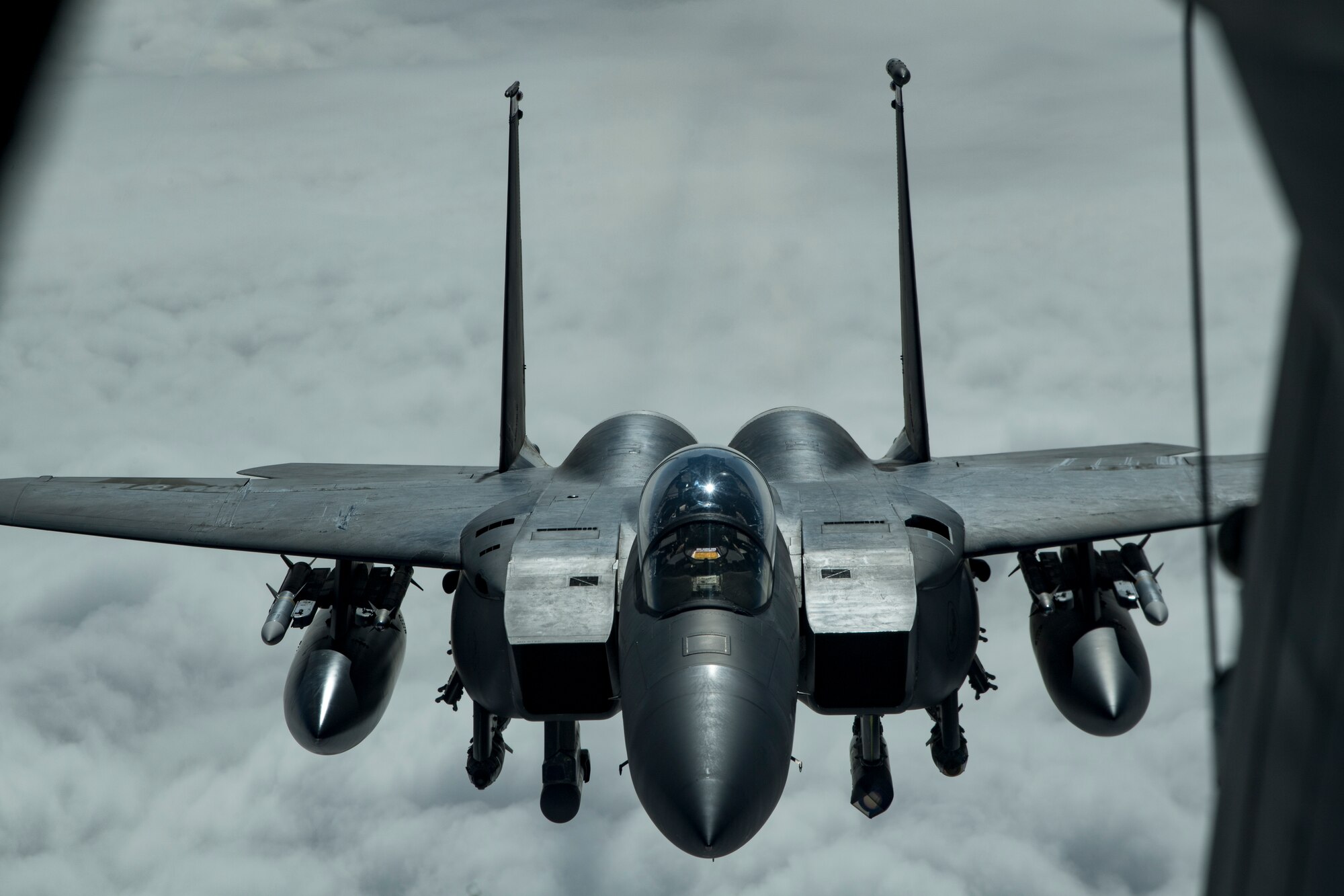 A U.S. Air Force F-15E Strike Eagle assigned to the 494th Expeditionary Fighter Squadron approaches the boom of a U.S. Air Force KC-10 Extender assigned to the 908th Expeditionary Air Refueling Squadron above the U.S. Central Command area of responsibility, Jan. 15, 2020.