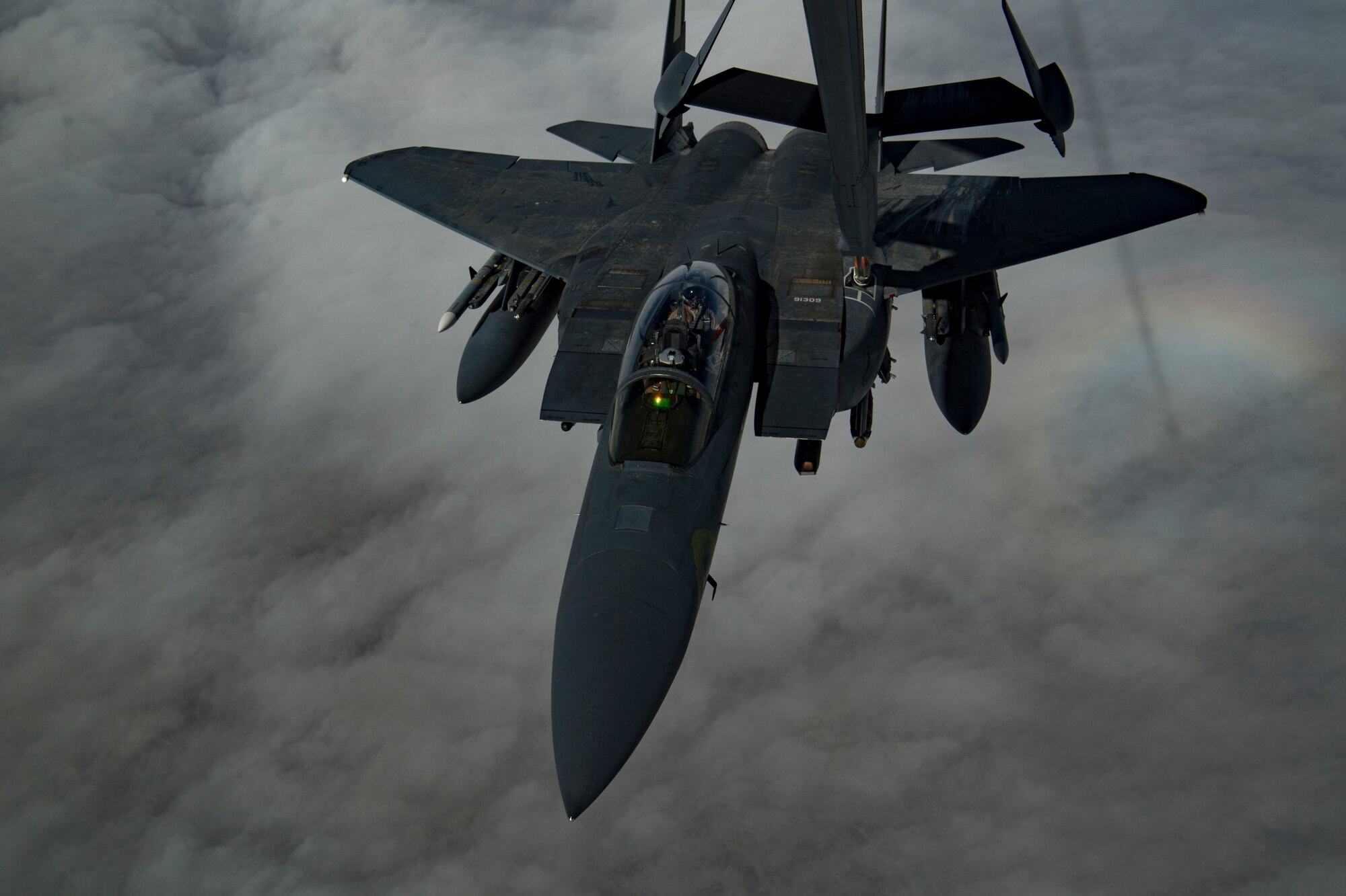 A U.S. Air Force F-15E Strike Eagle assigned to the 494th Expeditionary Fighter Squadron receives fuel from a U.S. Air Force KC-10 Extender assigned to the 908th Expeditionary Air Refueling Squadron above the U.S. Central Command area of responsibility, Jan. 15, 2020.
