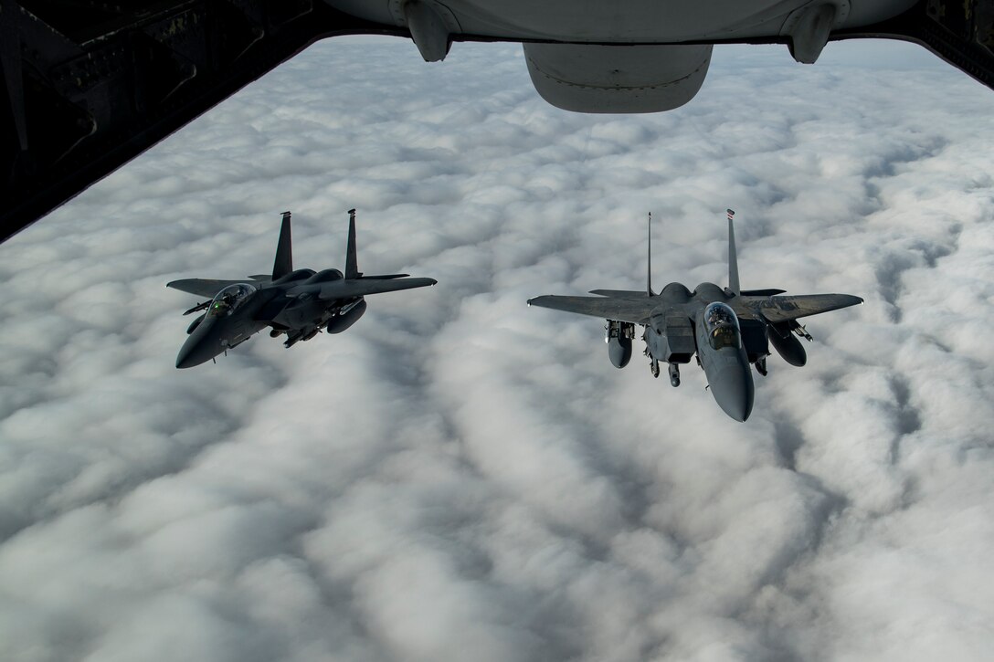 Two U.S. Air Force F-15E Strike Eagles assigned to the 494th Expeditionary Fighter Squadron fly above the U.S. Central Command area of responsibility, Jan. 15, 2020.