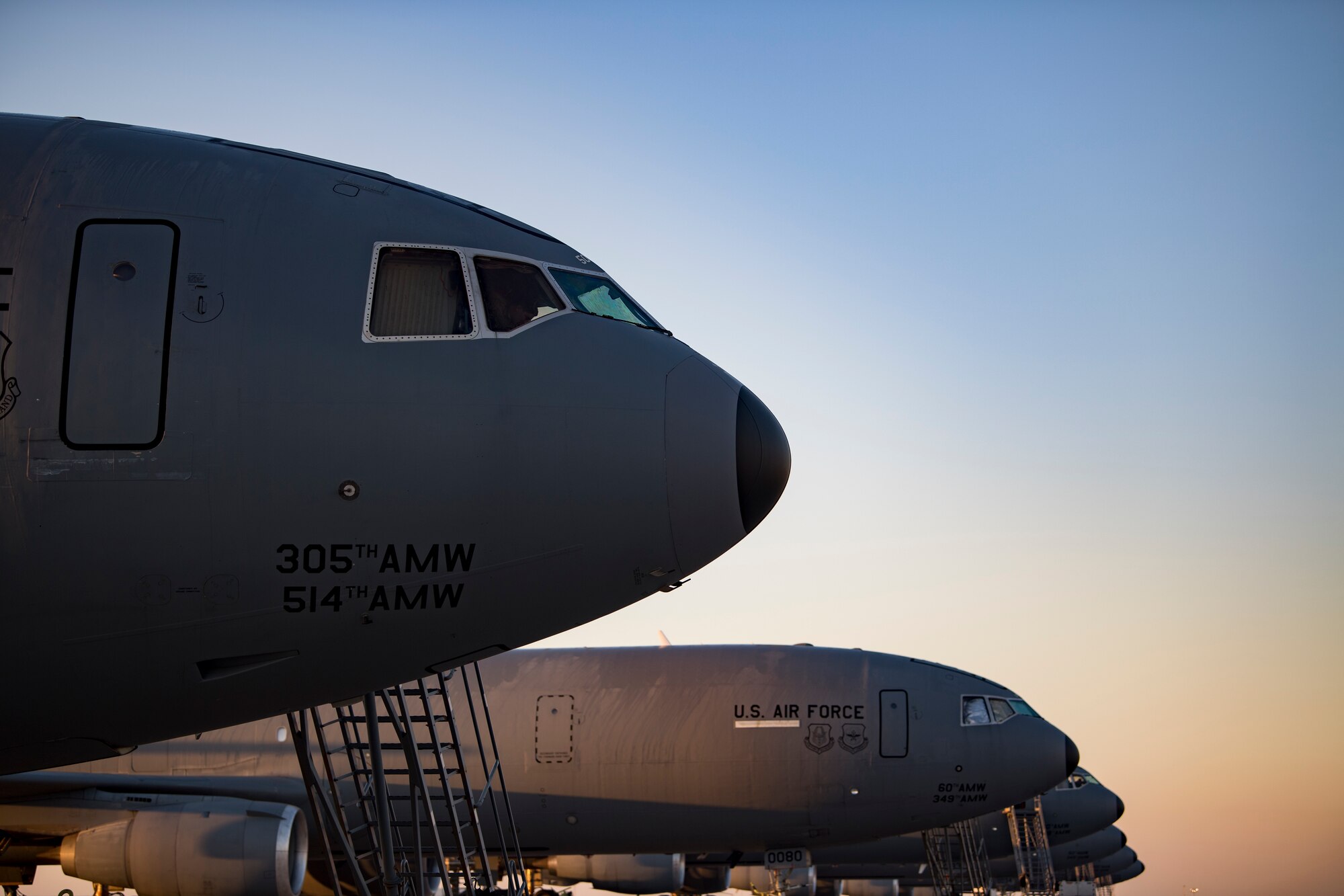 U.S. Air Force aircrew members assigned to the 908th Expeditionary Air Refueling Squadron conduct preflight checks on a KC-10 Extender at Al Dhafra Air Base, United Arab Emirates Jan. 17, 2020.