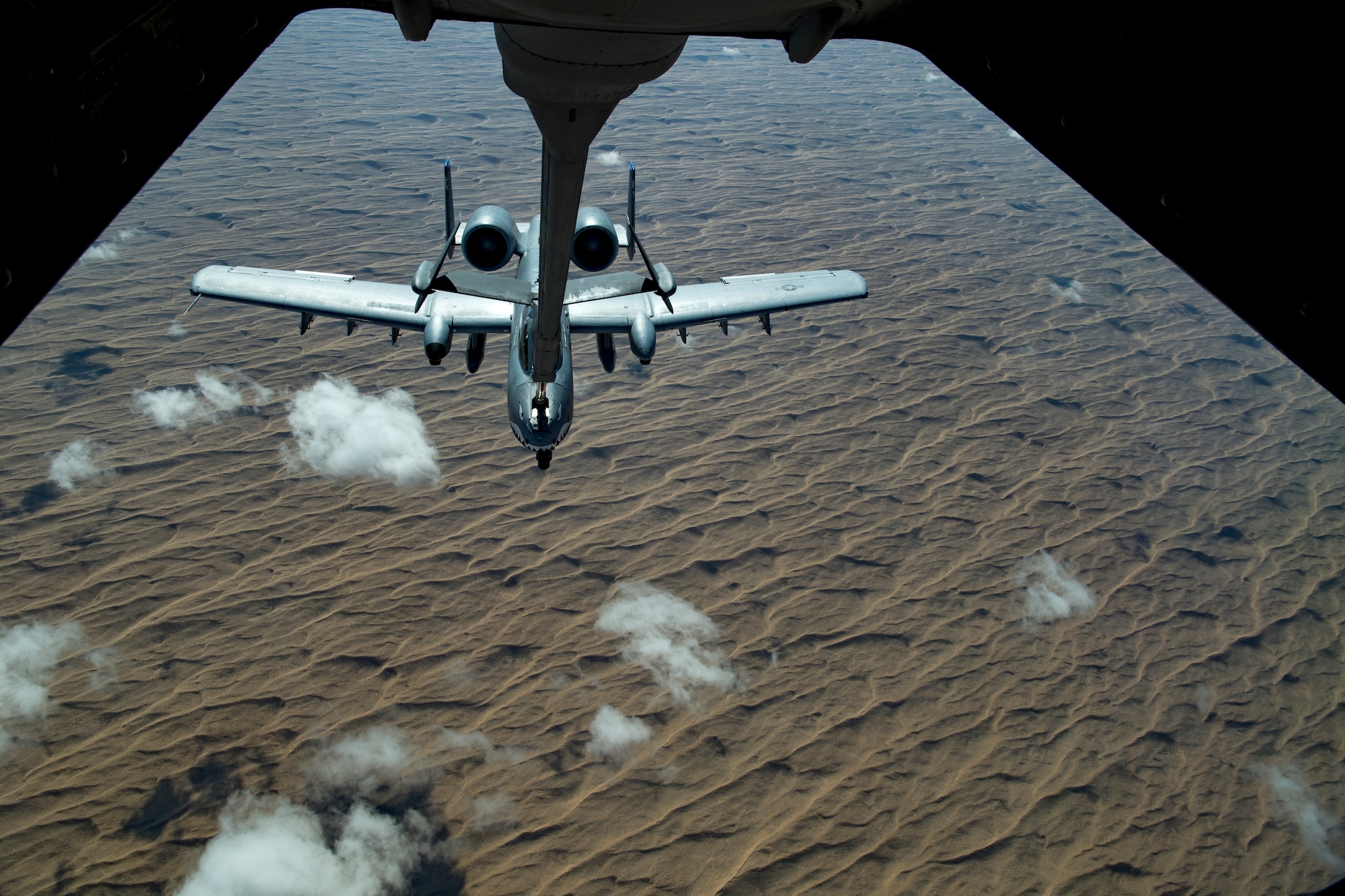 A U.S. Air Force A-10 Thunderbolt II receives fuel from a U.S. Air Force KC-10 Extender assigned to the 908th Expeditionary Air Refueling Squadron, deployed to Al Dhafra Air Base, United Arab Emirates, above the U.S. Central Command area of responsibility, Jan. 17, 2020.