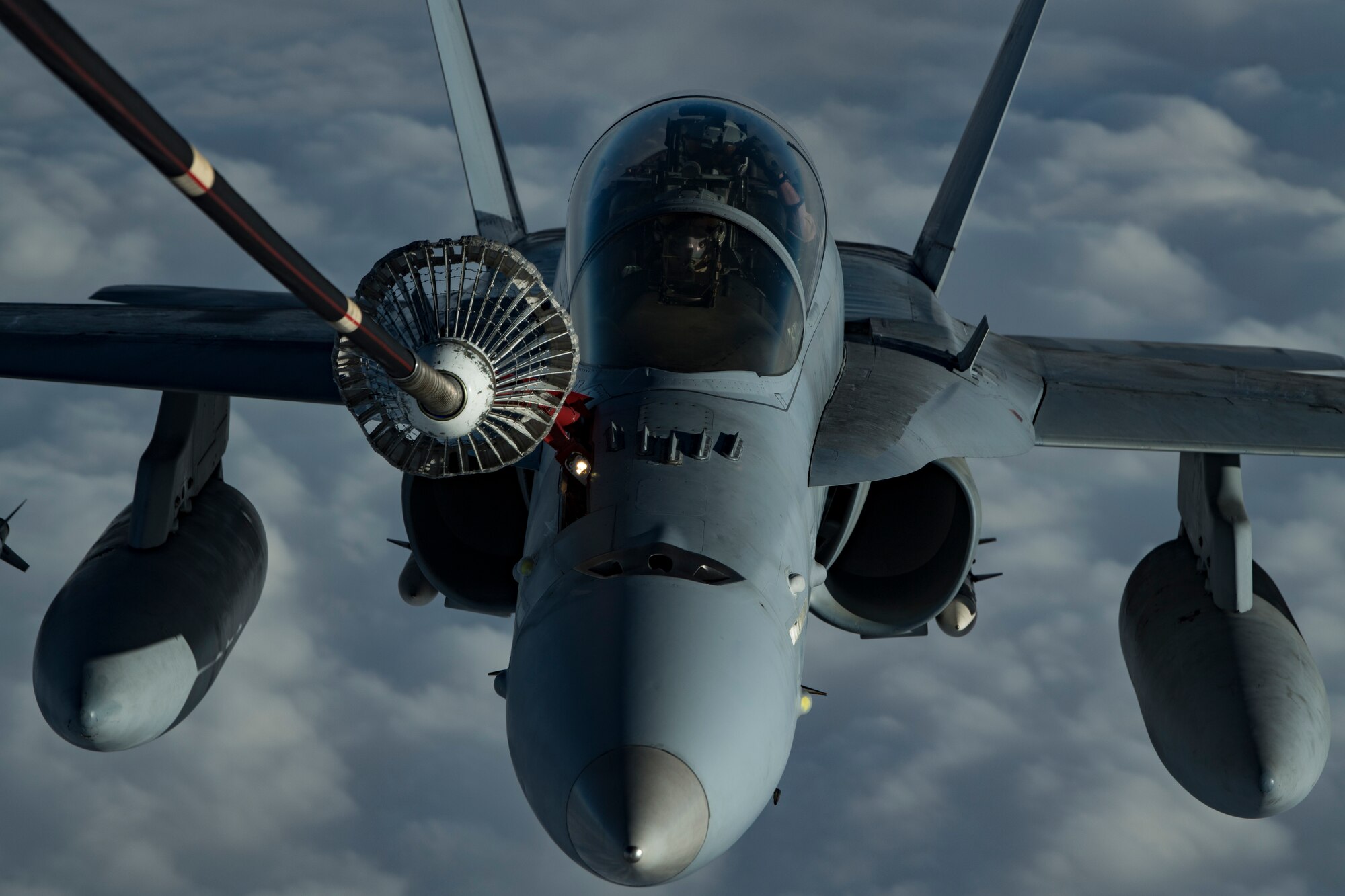 A U.S. Marine Corps F/A-18 Hornet assigned to Marine Fighter Attack Squadron (VMFA) 251 receives fuel from a U.S. Air Force KC-10 Extender assigned to the 908th Expeditionary Air Refueling Squadron above the U.S. Central Command area of responsibility, Jan. 22, 2020.