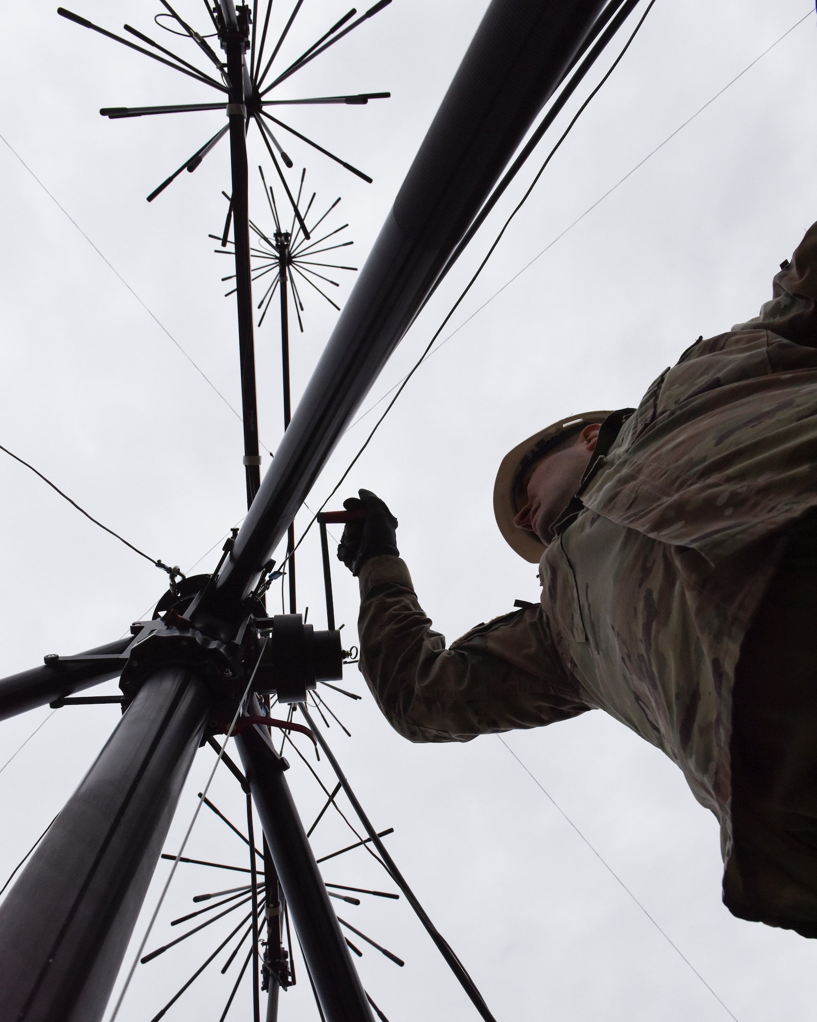 U.S. Air Force Tech. Sgt. Keith Schalk, an Arkansas Air National Guard Airmen, raises the top of the antenna that utilizes satellite systems to increase communications during responses to natural disasters in the state. (U.S. Air National Guard photo by Master Sgt. Jessica Roles)