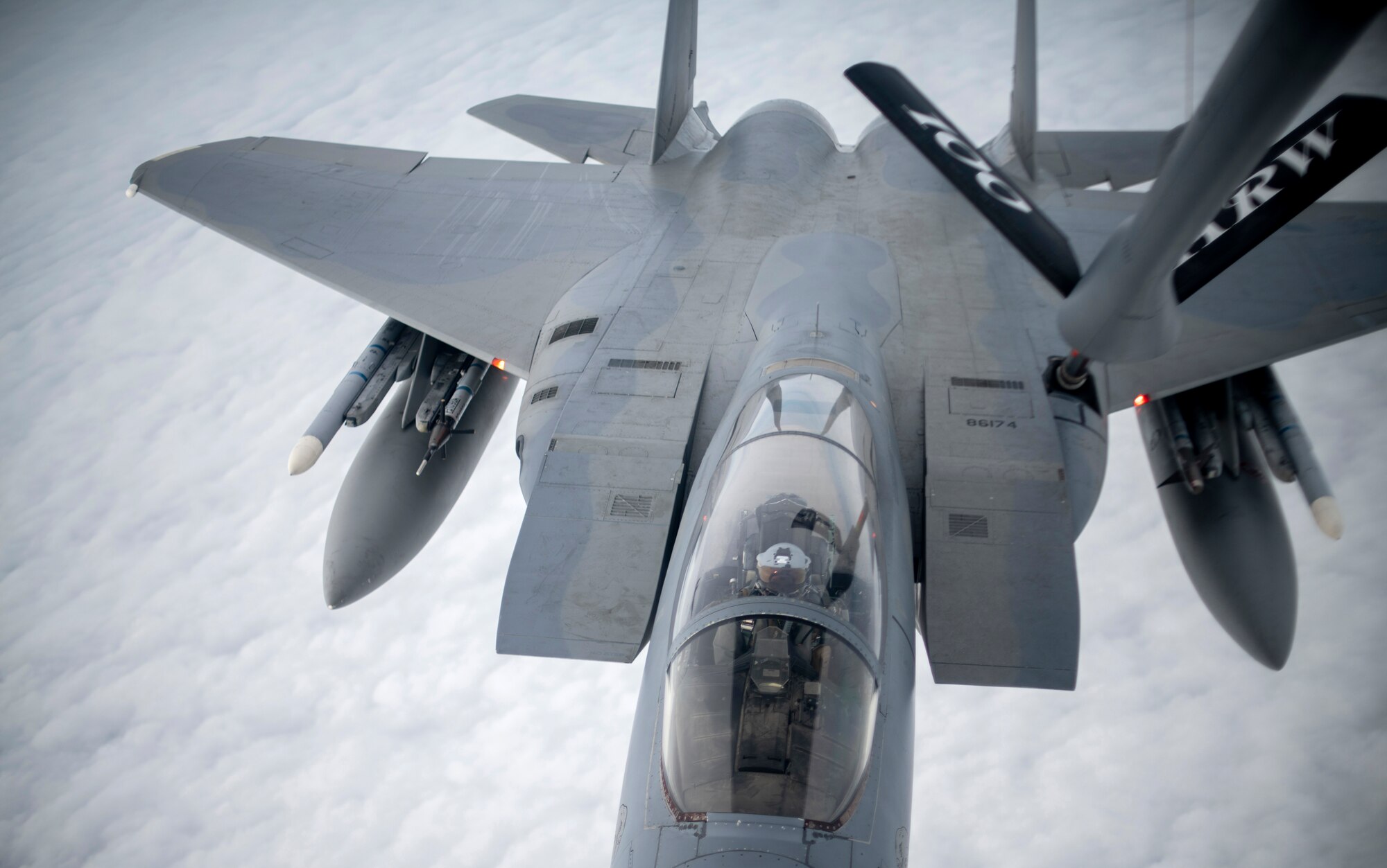A U.S. Air Force F-15C Eagle assigned to the 48th Fighter Wing, RAF Lakenheath, England, is refueled by a KC-135 Stratotanker from the 100th Air Refueling Wing, RAF Mildenhall, England, during exercise Point Blank off the English coast, Jan. 30, 2020. The exercise is a recurring large-force exercise designed and co-hosted by the Royal Air Force and the 48th Fighter Wing. (U.S. Air Force photo by Tech. Sgt. Emerson Nuñez)