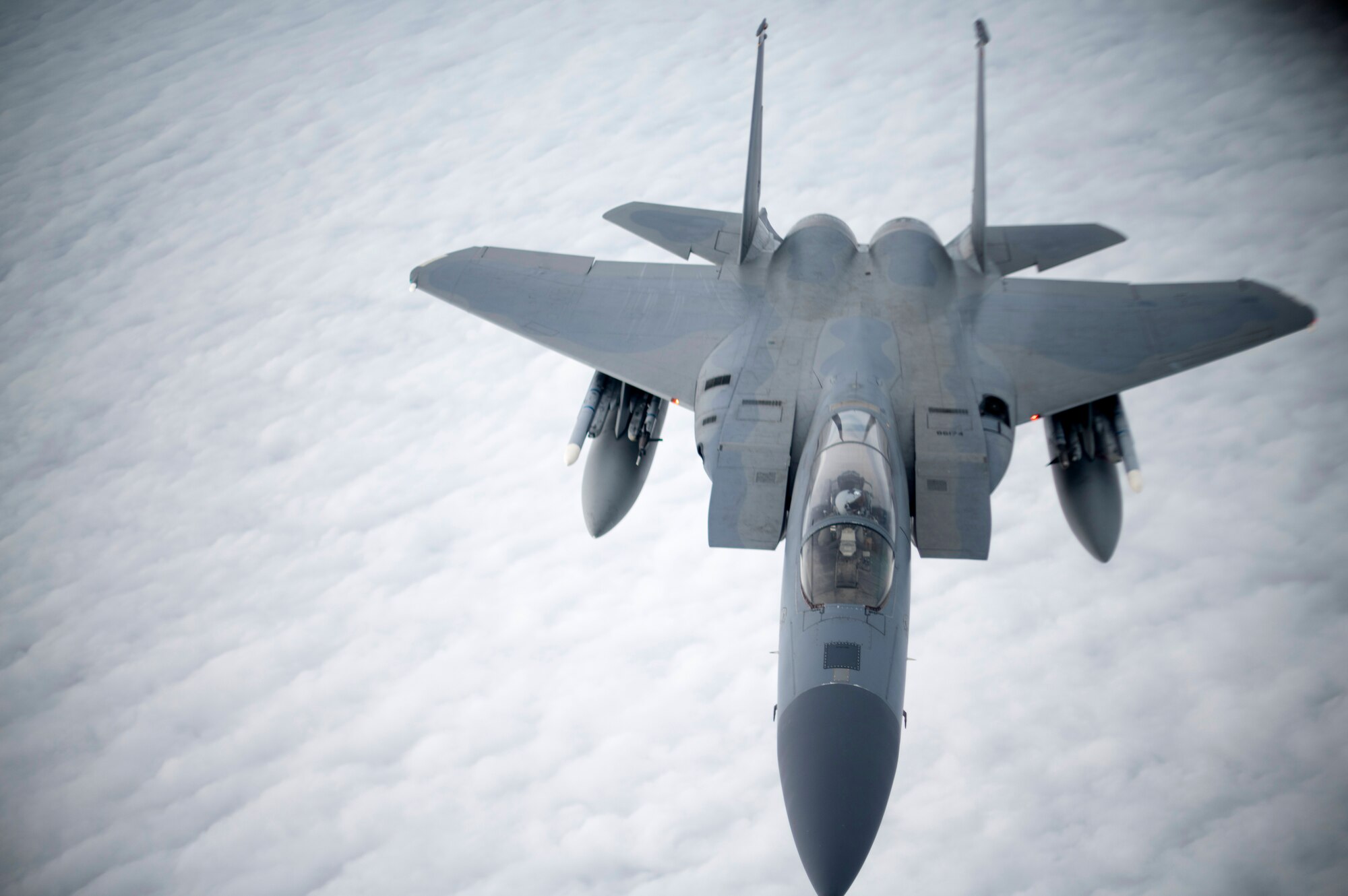 A U.S. Air Force F-15C Eagle assigned to the 48th Fighter Wing, RAF Lakenheath, England, flies away from a KC-135 Stratotanker from the 100th Air Refueling Wing, RAF Mildenhall, England, after receiving fuel during exercise Point Blank off the English coast, Jan. 30, 2020. Point Blank is a recurring, low-cost exercise initiative designed to increase tactical proficiency of U.S. Air Forces in Europe – Air Forces Africa and Ministry of Defence forces. (U.S. Air Force photo by Tech. Sgt. Emerson Nuñez)