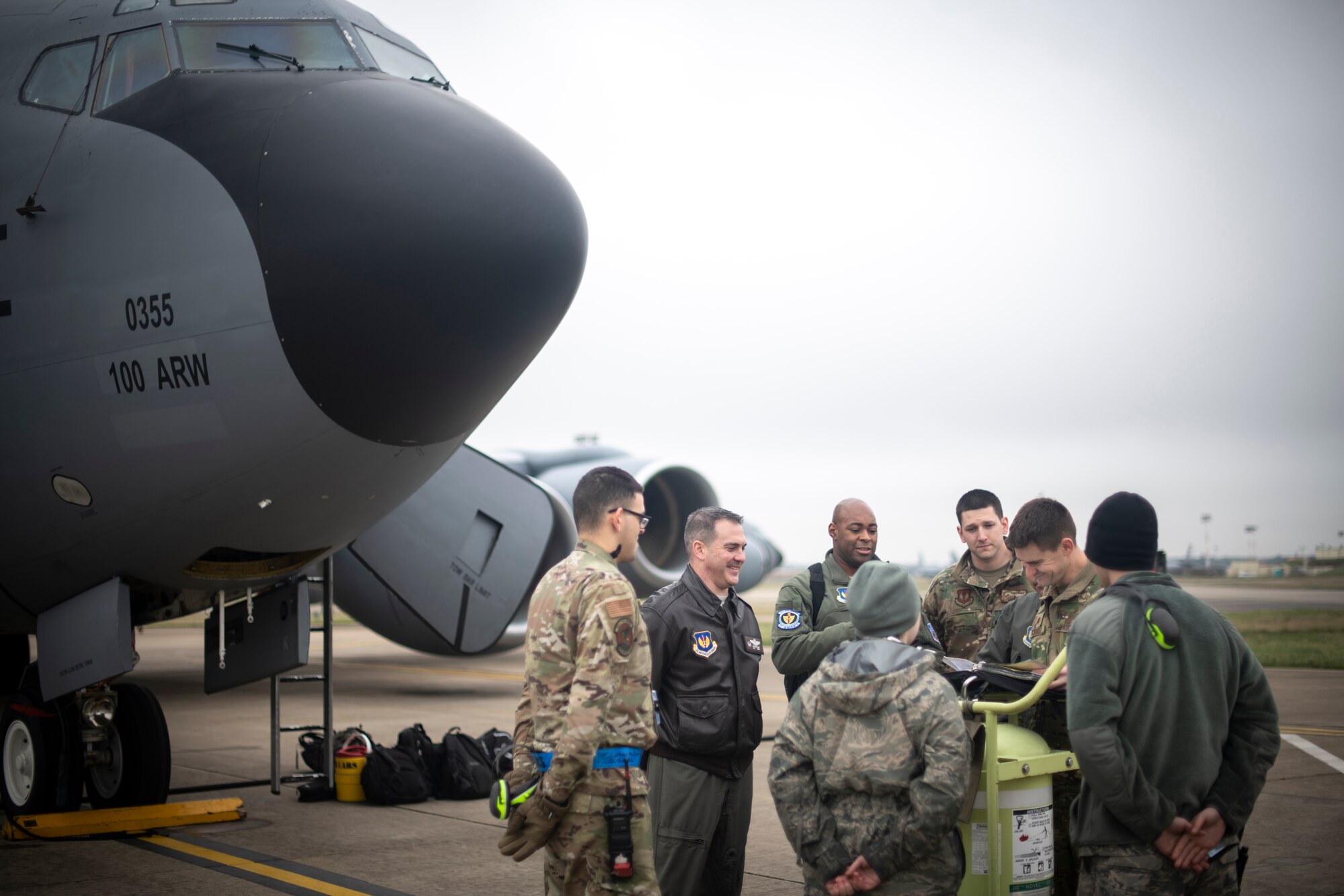 Airmen from the 351st Air Refueling Squadron and 100th Aircraft Maintenance Squadron review a checklist prior to a flight supporting exercise Point Blank at RAF Mildenhall, England, Jan. 30, 2020. The exercise is a recurring large-force exercise designed and co-hosted by the Royal Air Force and the 48th Fighter Wing. (U.S. Air Force photo by Tech. Sgt. Emerson Nuñez)