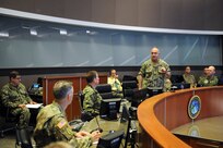 U.S. Navy Adm. Charles “Chas” Richard, commander of U.S. Strategic Command (USSTRATCOM), speaks to his key staff on the battle deck of USSTRATCOM’s command and control facility (C2F) during Exercise Global Lightning 20 at Offutt Air Force Base, Neb., Jan. 30, 2020. Global Lightning 20 tested executing global operations in coordination with the Joint Staff, 5 other combatant commands, services, U.S. government agencies, and allies to deter, detect and, if necessary, defeat strategic attacks against the United States and its allies. This is the first major exercise USSTRATCOM conducted entirely from the C2F, the command’s newest weapon system that enables it to connect to national leadership, all three legs of the triad, and other platforms key to executing operations.