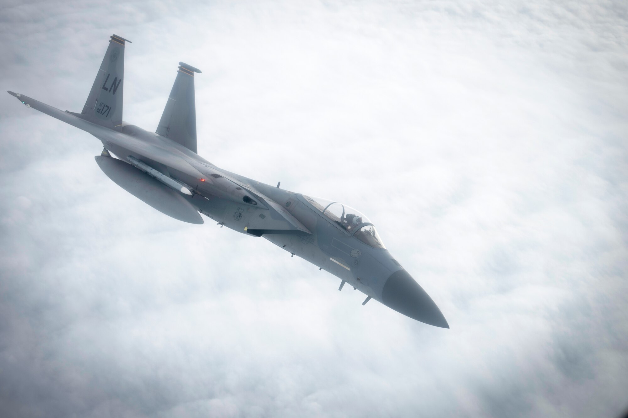 F-15C Eagle flies away from a KC-135 Stratotanker