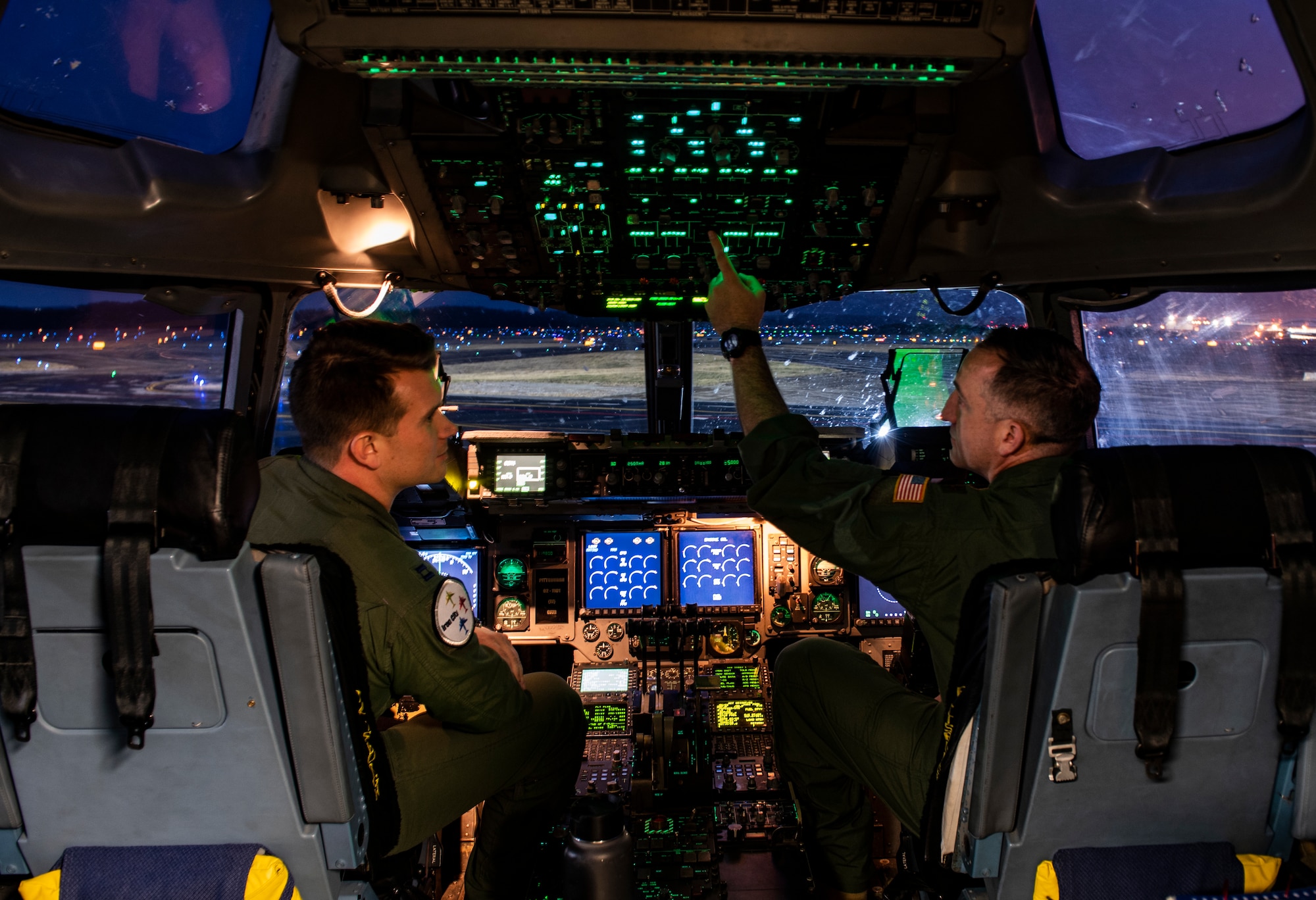 Capt. Adam Stahl and Maj. Jacob Predis, 758th Airlift Squadron pilots, perform preflight operations at the Pittsburgh International Airport Air Reserve Station, Pennsylvania, Jan. 16, 2020. The flight provided vital training for aircrew members including nighttime touch-and-go practice at Wright-Patterson Air Force Base, Ohio.