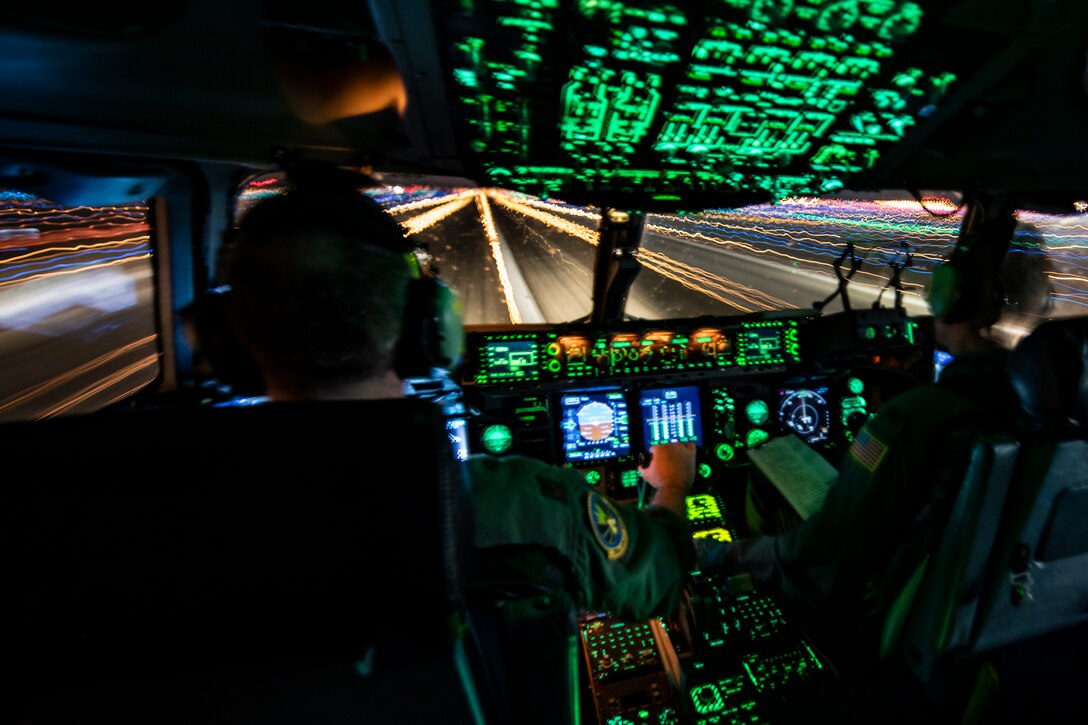 Maj. Jacob Predis, 758th Airlift Squadron pilot, and Col. John F. Robinson, 911th Airlift Wing commander, take off from the Pittsburgh International Airport Air Reserve Station, Pennsylvania, Jan. 16, 2020. The flight provided vital training for aircrew members including nighttime touch-and-go practice at Wright-Patterson Air Force Base, Ohio