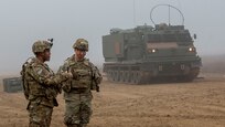 Col. Seth Knazovich, brigade commander of the 41 Field Artillery Brigade listens to Lt. Col. Angel Llompart, battalion commander of the 1st battalion 6th field artillery regiment, during a reload drill for a live-fire exercise January 27, 2020, Grafenwoehr, Germany. This is the first live-fire exercise from a European based unit since 2006.