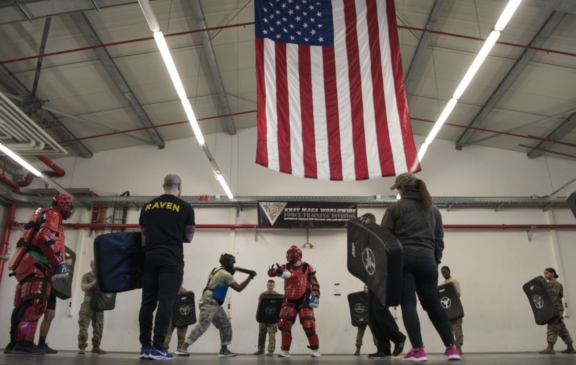 U.S. Air Force Airman 1st Class Jalen Branch, 7th Reconnaissance Squadron internal security response member and Raven applicant, stationed at Naval Air Station Sigonella, Italy, strikes the “Redman” using his baton during a live practice on Ramstein Air Base, Germany, Jan. 16, 2020. Branch practiced baton strikes, blocking, and evasive maneuvers for the following day’s “Redman” exercise. The “Redman” exercise, when run at 100 percent intensity, simulates a hostile individual actively seeking to harm the defender -- a situation Branch could find himself in once he completes the qualification course and becomes a Raven. The Ramstein Air Base Ravens pre-qualification course, instructed by the 86th Security Forces Ravens section, tests an applicant’s ability to endure extreme mental and physical strain in preparation for the 26-day Raven qualification course at Joint Base McGuire-Dix-Lakehurst, N.J. (U.S. Air Force photo by Senior Airman Kristof J. Rixman)