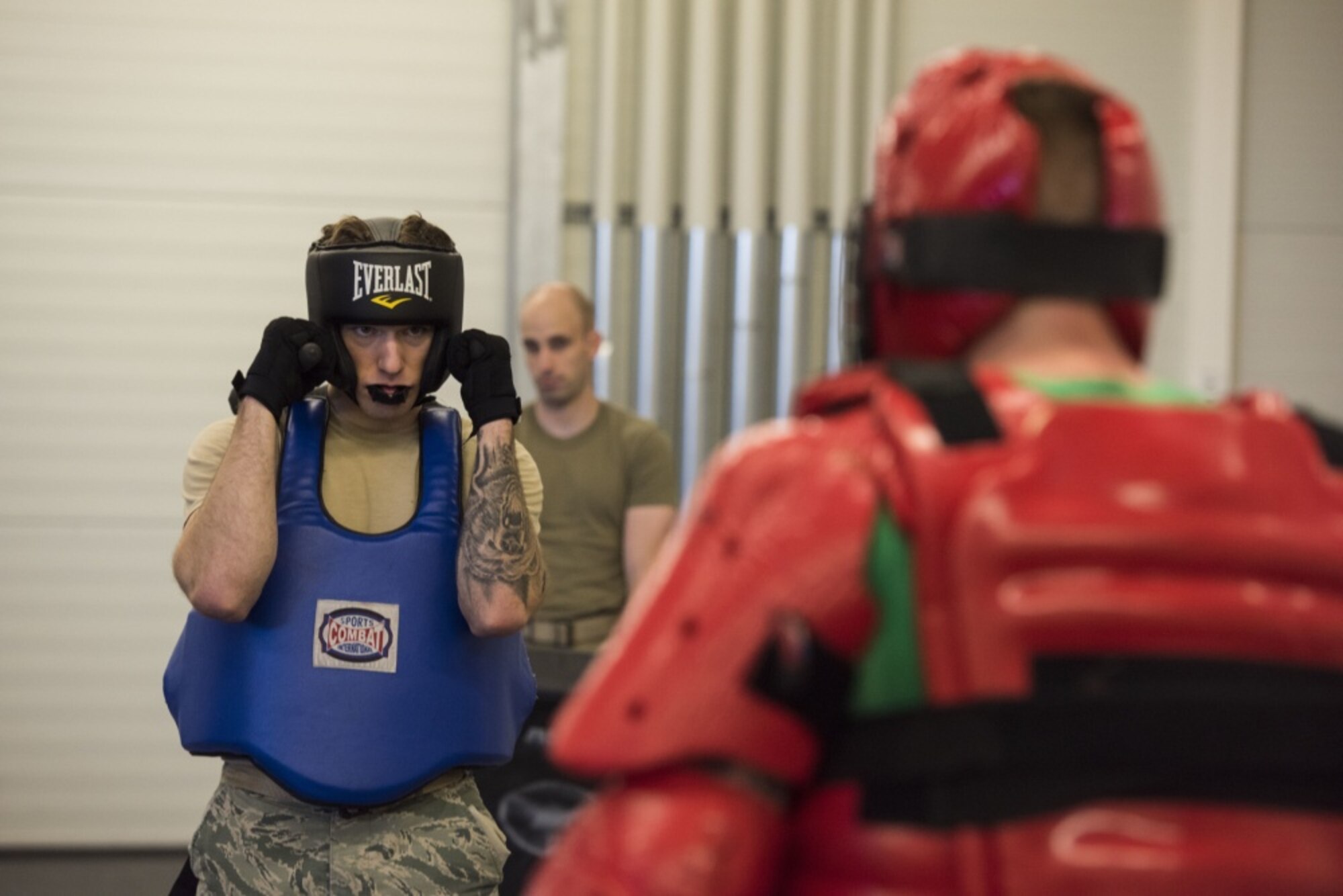 U.S. Air Force Airman 1st Class Trevor Holman, 7th Reconnaissance Squadron area supervisor and Raven applicant, stationed at Naval Air Station Sigonella, Italy, squares off against his opponent in the “Redman” exercise -- an exercise which simulates a hostile individual actively seeking to harm the defender. Throughout a Raven applicant’s training for the “Redman” exercise, they learn how to protect themselves and deter a potential adversary without using excessive force. The Ramstein Air Base Ravens pre-qualification course, instructed by the 86th Security Forces Ravens section, tests an applicant’s ability to endure extreme mental and physical strain in preparation for the 26-day Raven qualification course at Joint Base McGuire-Dix-Lakehurst, N.J. (U.S. Air Force photo by Senior Airman Kristof J. Rixmann)