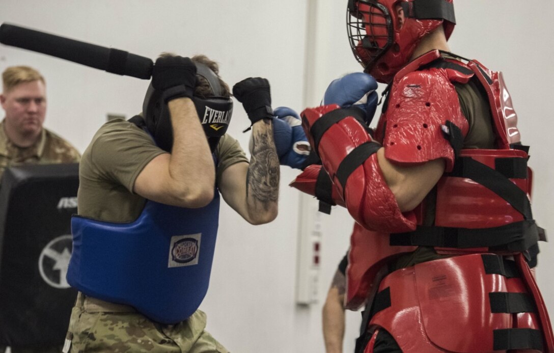 U.S. Air Force Airman 1st Class Trevor Holman, 7th Reconnaissance Squadron area supervisor and Raven applicant, stationed at Naval Air Station Sigonella, Italy, blocks a blow during the “Redman” exercise as part of the 86th Security Forces Raven pre-qualification course on Ramstein Air Base, Germany, Jan. 17, 2020. The purpose of the “Redman” exercise” is to simulate a hostile individual actively seeking to harm the defender. Throughout a Raven applicant’s training for the “Redman” exercise, they learn how to protect themselves and deter a potential adversary without using excessive force. The Ramstein Air Base Ravens pre-qualification course, instructed by the 86th Security Forces Ravens section, tests an applicant’s ability to endure extreme mental and physical strain in preparation for the 26-day Raven qualification course at Joint Base McGuire-Dix-Lakehurst, N.J. (U.S. Air Force photo by Senior Airman Kristof J. Rixmann)