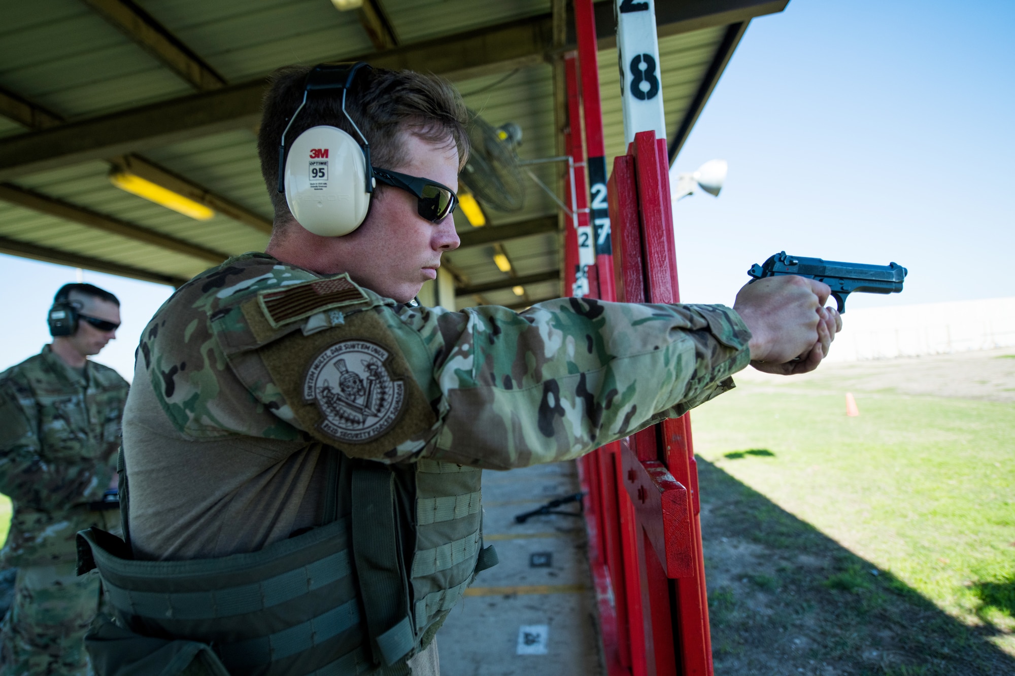 U.S. Air Force Security Forces Airmen take part in the firing range portion of the Air Education and Training Command Defender Challenge team tryout at Joint Base San Antonio-Medina Annex, Texas, Jan. 27, 2020. The five-day selection camp includes a physical fitness test, M-9 and M-4 weapons firing, the alpha warrior obstacle course, a ruck march and also includes a military working dog tryout as well. A total of 27 Airmen, including five MWD handlers and their canine partners, were invited to tryout for the team. The seven selectees to the AETC team will represent the First Command at the career field’s world-wide competition that will be held at JBSA-Camp Bullis in May 2020. (U.S. Air Force photo by Sarayuth Pinthong)