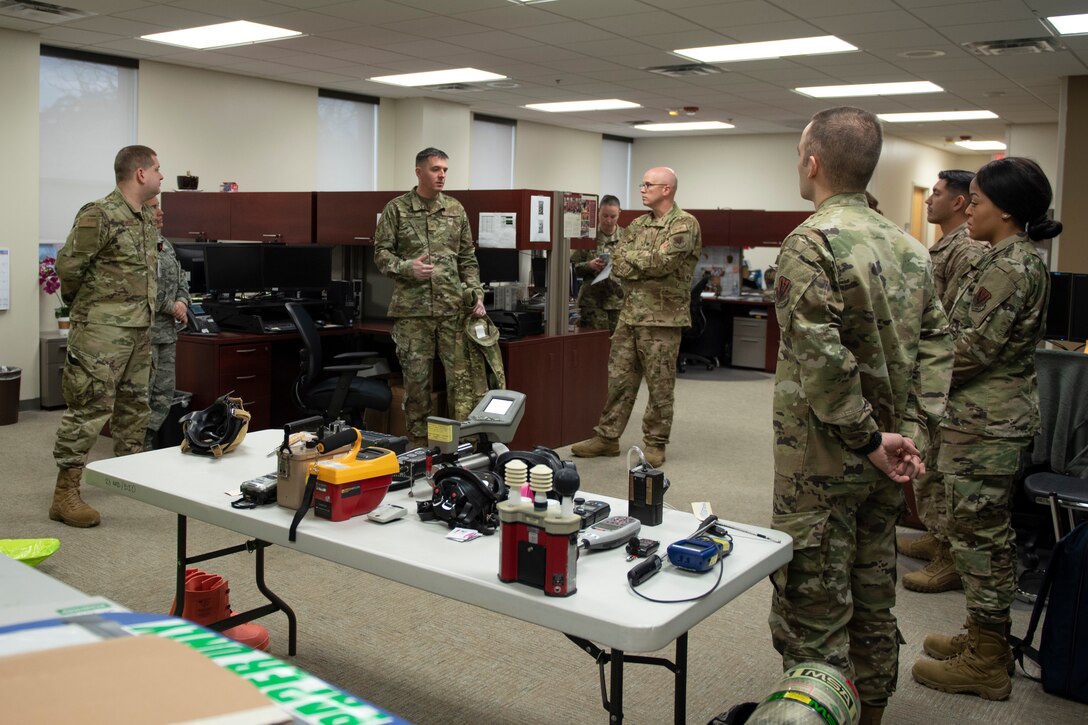 A photo of leadership talking to Airmen during an immersion tour.