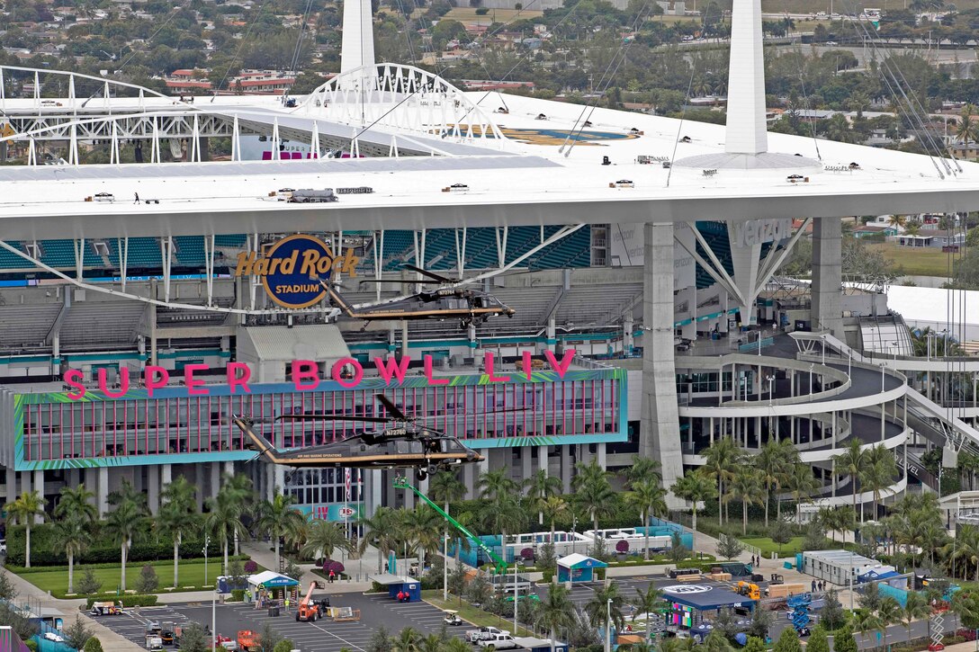 An aerial view of Hard Rock Stadium in Miami as a helicopter flies past the “Super Bowl LIV” sign