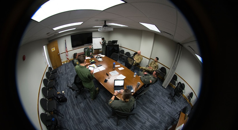 Test participants prepare for an airdrop in support of Air Mobility Command Test and Evaluation Squadron’s assessment of tactics, techniques and procedures for astronaut rescue and recovery efforts Jan. 21, 2020, at Patrick Air Force Base, Fla.  In addition to members of Detachment 3, of the 45th Operations Group, the test participants included C-17 aircrew from Joint Base Charleston, S.C., and Air National Guard members from Joint Base Pearl Harbor-Hickam, H.I., and Joint Base Elmendorf-Richardson, A.K.