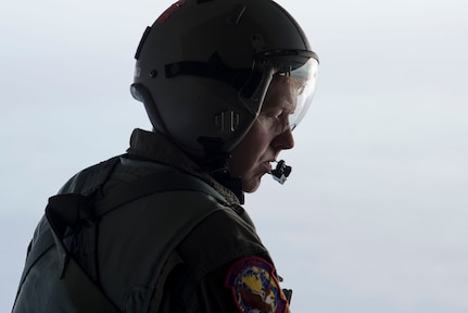 Tech. Sgt. Seth Dunworth, 15th Airlift Squadron loadmaster, prepares to deploy illumination flares and position markers from the ramp of the aircraft during Air Mobility Command Test and Evaluation Squadron’s assessment of tactics, techniques and procedures for astronaut rescue and recovery efforts Jan. 22, 2020, off the coast of Florida near Patrick Air Force Base.