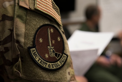 An Air Mobility Command Test and Evaluation Squadron member from Joint Base McGuire-Dix-Lakehurst, New Jersey, attends a mission briefing during an AMCTES assessment of tactics, techniques and procedures for astronaut rescue and recovery efforts Jan. 21, 2020, at Patrick Air Force Base, Fla. In addition to members of Detachment 3, of the 45th Operations Group, the test participants included C-17 aircrew from Joint Base Charleston, S.C., and Air National Guard members from Joint Base Pearl Harbor-Hickam, H.I., and Joint Base Elmendorf-Richardson, A.K.