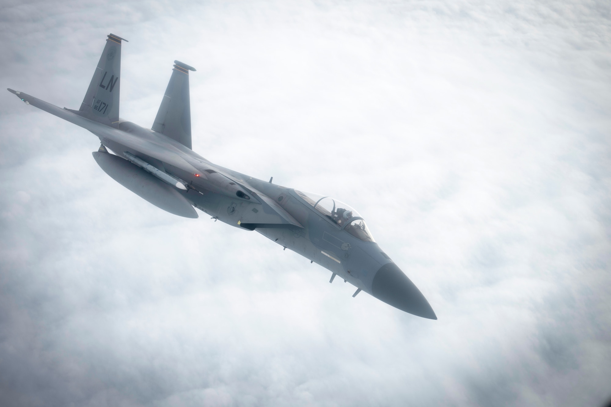 A U.S. Air Force F-15C Eagle assigned to the 48th Fighter Wing, RAF Lakenheath, England, flies away from a KC-135 Stratotanker from the 100th Air Refueling Wing, RAF Mildenhall, England, after receiving fuel during exercise Point Blank off the English coast, Jan. 30, 2020. Point Blank is a recurring, low-cost exercise initiative designed to increase tactical proficiency of U.S. Air Forces in Europe – Air Forces Africa and Ministry of Defence forces. (U.S. Air Force photo by Tech. Sgt. Emerson Nuñez)