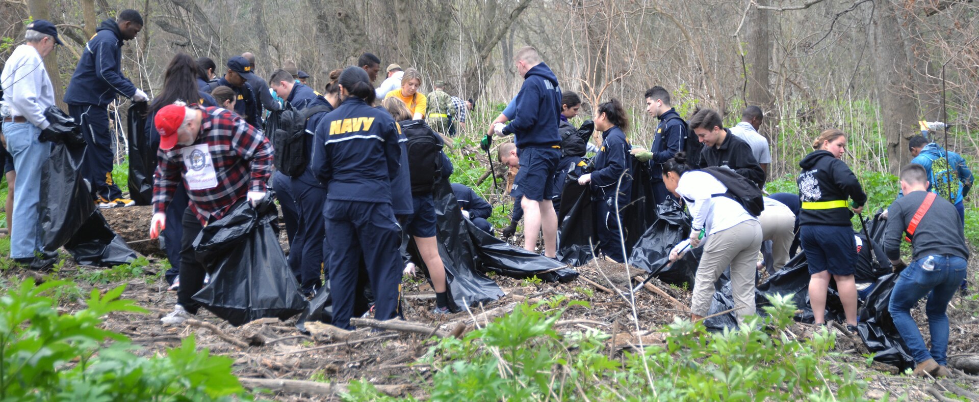It was definitely a joint service effort Feb. 16, 2019, as hundreds of Soldiers, Sailors and Airmen were all in to help clean out thousands of pounds of trash from an important waterway which runs through JBSA-Fort Sam Houston, working throughout the morning to clear out a year's worth of accumulated debris.