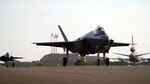 An F-35A Lightning II joint strike fighter returns to a base in Southwest Asia, Nov. 16, 2019. In the future, defense contractors involved in the development of systems like the F-35 will need to show their company’s cybersecurity programs meet Defense Department standards.