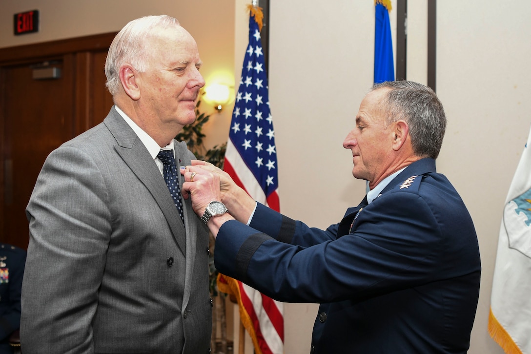 U.S. Air Force Chief of Staff Gen. David L. Goldfein inducts Mr. Kjell Bergh into the civic leader program during the Air Force Civic Leader Conference at Joint Base Andrews, Md., Jan. 30, 2020. The purpose of the program is to create and strengthen relationships between senior leaders, civic leaders and congressional leaders. (U.S. Air Force Photo by Airman 1st Class Spencer Slocum)