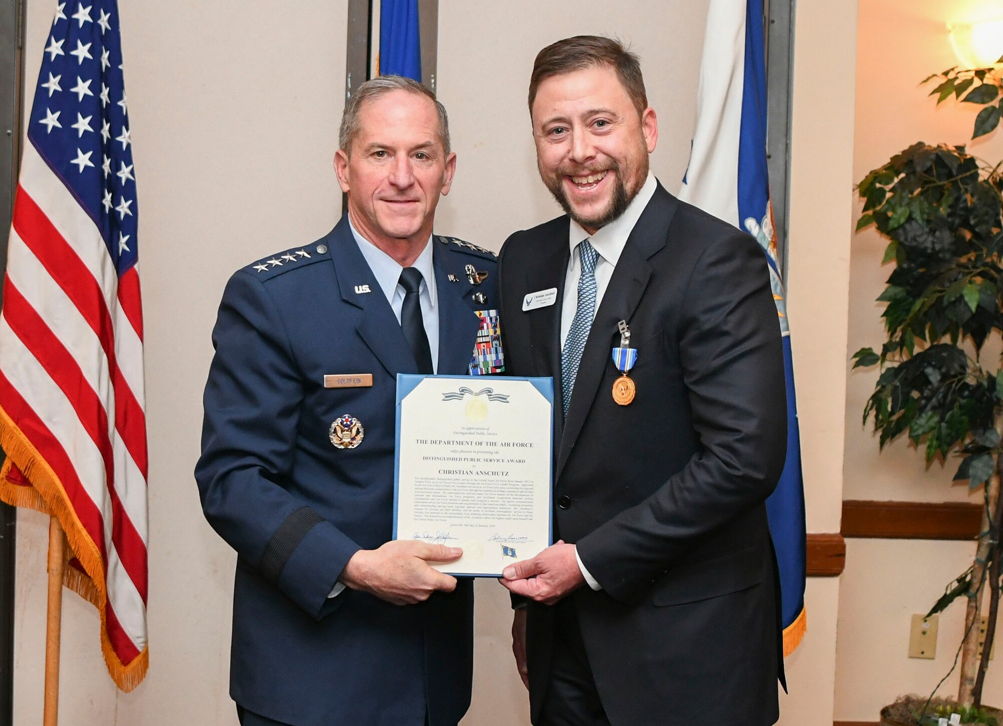 U.S. Air Force Chief of Staff Gen. David L. Goldfein presents the Distinguished Public Service Award to Mr. Christian Anschutz during the Air Force Civic Leader Conference at Joint Base Andrews, Md., Jan. 30, 2020. Civic leaders provide ideas and feedback and advise Air Force senior leaders about how missions can best be accomplished in their respective areas. (U.S. Air Force Photo by Airman 1st Class Spencer Slocum)