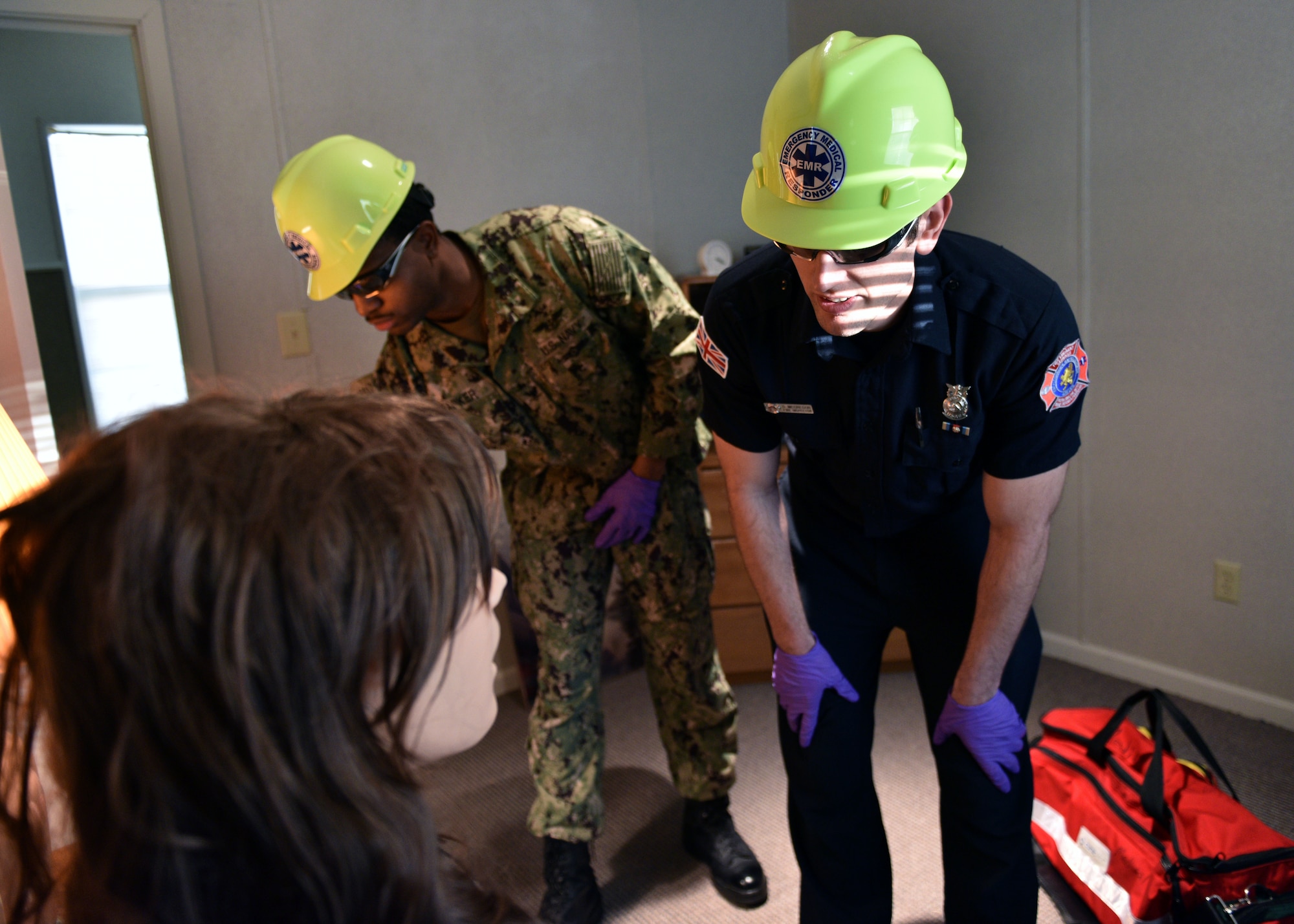 Students from the 312th Training Squadron arrive to a simulated emergency scene during the Emergency Medical Responders course, Jan. 28, 2020, at the Louis F. Garland Department of Defense Fire Academy on Goodfellow Air Force Base, Texas. The EMR course consists of both classroom lecture and hands-on skills training which covers patient assessment, treatment, and use of various medical equipment. (U.S. Air Force photo by Airman 1st Class Robyn Hunsinger)
