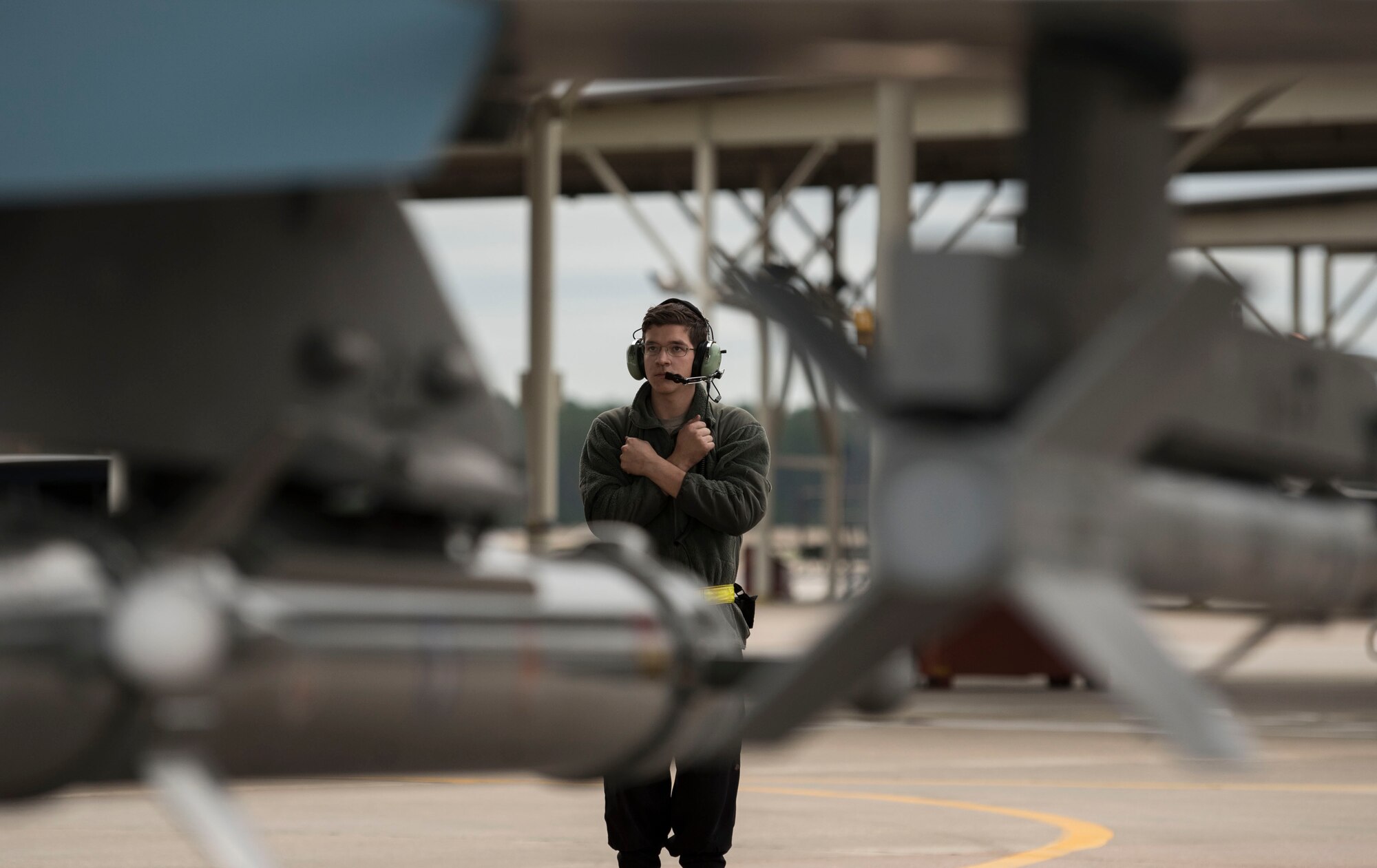 U.S. Air Force Airman 1st Class Gabriel Garcia, 57th Aircraft Maintenance Squadron crew chief, marshals a 64th Aggressor Squadron pilot at Shaw Air Force Base, South Carolina, Jan. 15, 2020.