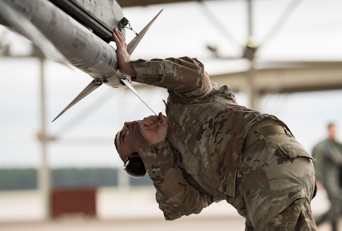 U.S. Air Force Tech. Sgt. Matthew Delpit, 57th Aircraft Maintenance Squadron weapons load crew chief, completes post-flight inspections at Shaw Air Force Base, South Carolina, Jan. 15, 2020.