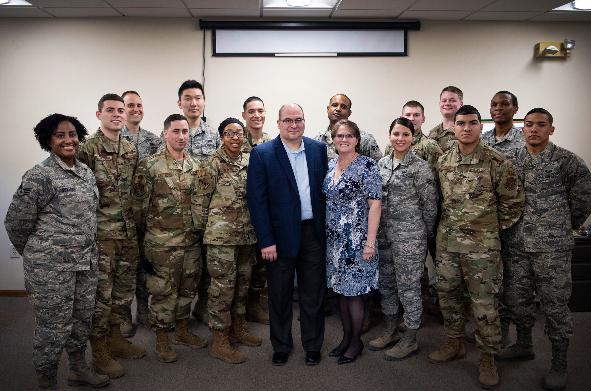 John Levitow Jr., son of Medal of Honor recipient Sgt. John Levitow, and his wife, Lucy, pose for a photo with the cadre and students of Hanscom Airman Leadership School Class 20C at Hanscom Air Force Base, Mass., Jan. 31. The John L. Levitow Award is the pinnacle of achievement for Air Force enlisted professional military education. (U.S. Air Force photo by Lauren Russell)