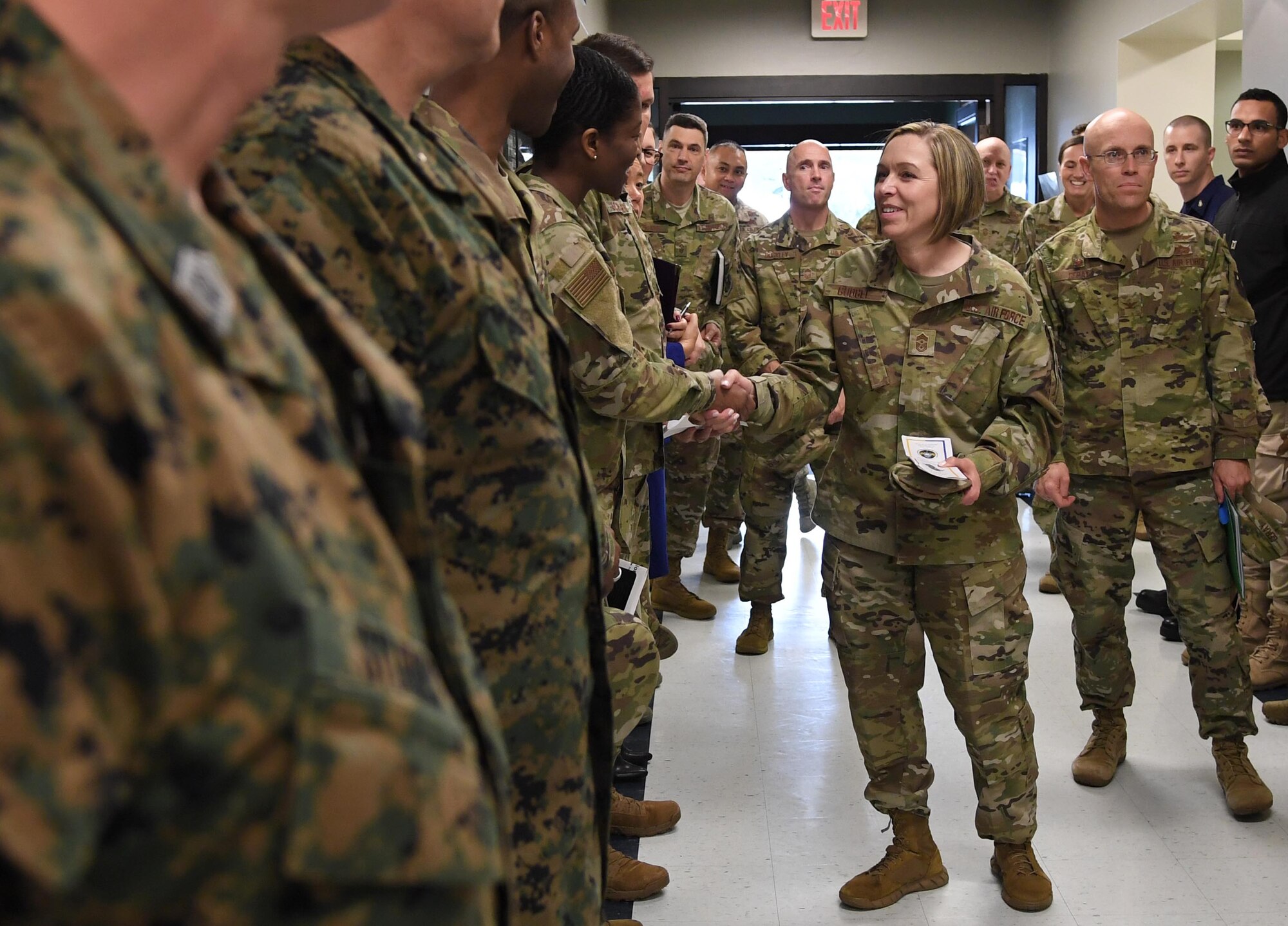 U.S. Air Force Chief Master Sgt. Julie Gudgel, command chief of Air Education and Training Command, introduces herself to 335th Training Squadron personnel during an immersion tour inside the Joint
Weather Training Facility at Keesler Air Force Base, Mississippi, Jan. 30, 2020. Gudgel joined Lt. Gen. Brad Webb, commander of AETC, during the visit to Keesler in order to become more familiar with the mission capabilities of the 81st Training Wing and to view the paradigm shift occurring in the training environment within the 81st Training Group. (U.S. Air Force photo by Kemberly Groue)