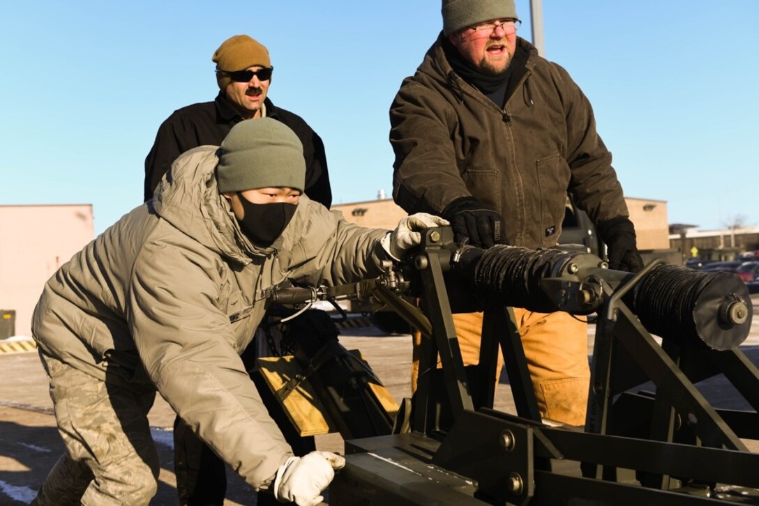 Airman Alex Hong, 28th Logistics Readiness Squadron traffic management apprentice, loads cargo into a semi-truck at Ellsworth Air Force Base, S.D., Jan. 16, 2020, in preparation for an exercise. Members of the 28th LRS supply and equip the 28th Bomb Wing and the wing’s tenant units through sections charged with vehicle management; petroleum, oils, and lubricants; and distribution and deployment.