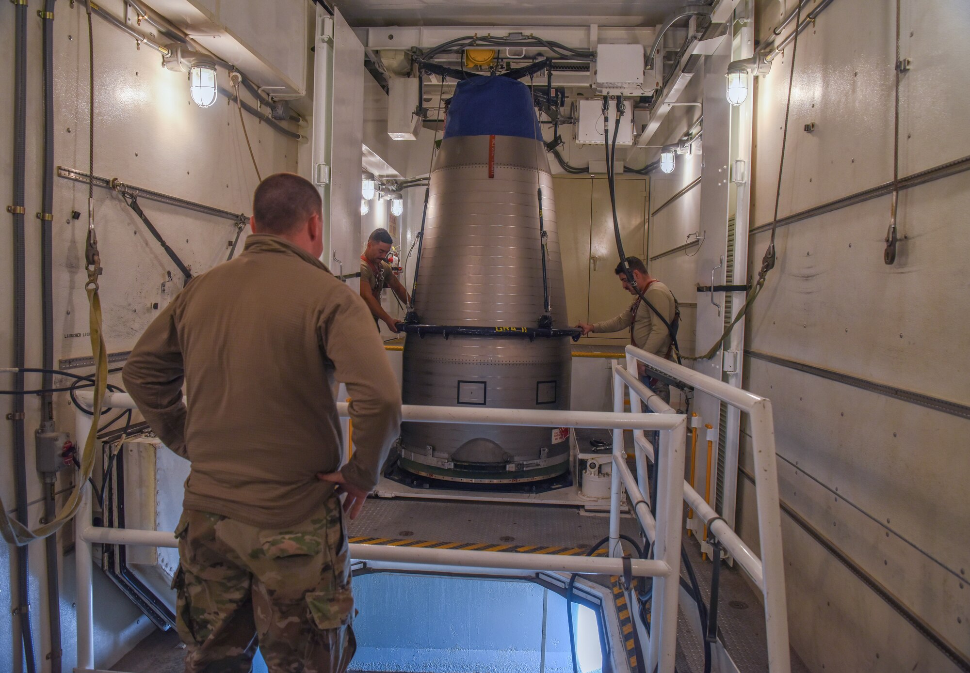 Airmen from the 90th Maintenance Group are responsible for maintaining and repairing ICBMs on alert status Dec. 18, 2019, within the F.E. Warren missile complex, as they are one of three missile bases part of Air Force Global Strike Command. The Minuteman III, on alert at all three bases, replaced the Peacekeeper at F.E. Warren in the 1970s. (U.S. Air Force photo by Senior Airman Abbigayle Williams)