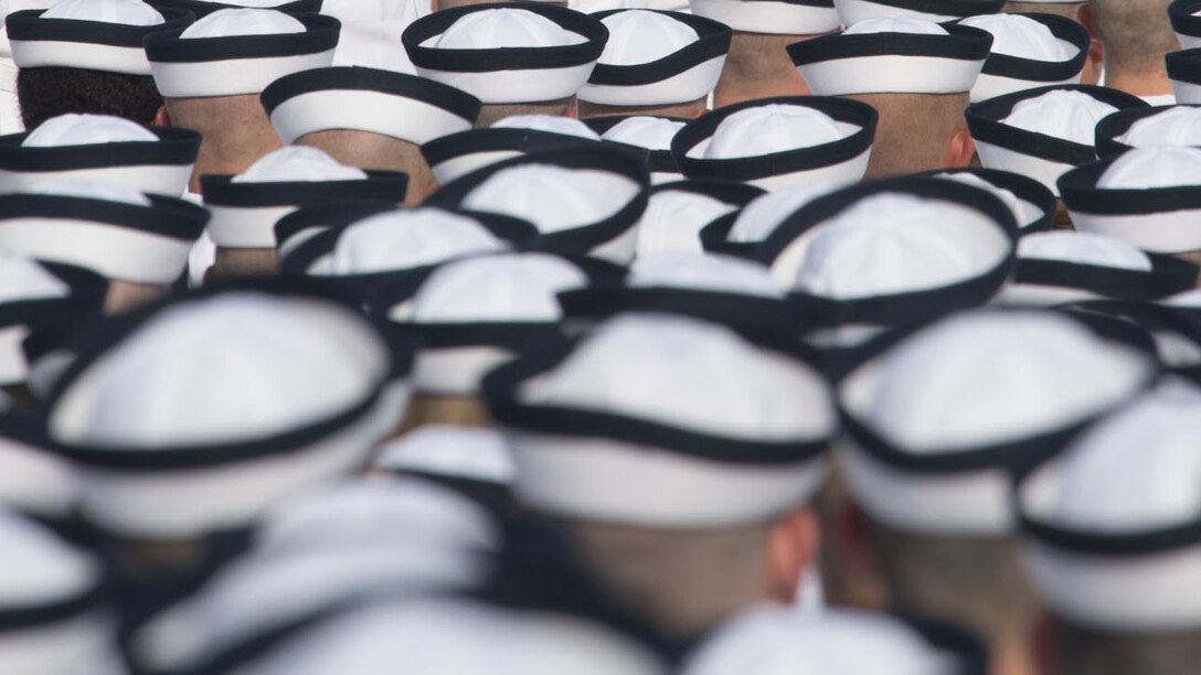 Backs of midshipmen’s heads.