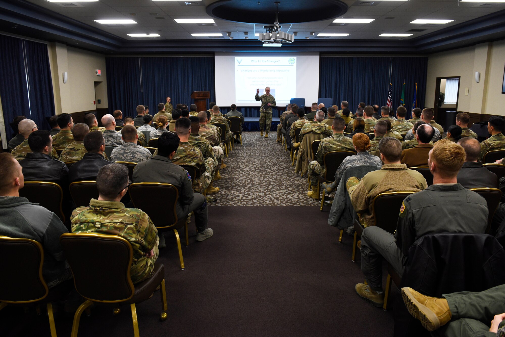 U.S. Air Force Col. Derek Salmi, 92nd Air Refueling Wing commander, addresses attendees of an officer's all-call at Fairchild Air Force Base, Washington, Jan. 28, 2020. Topics discussed during the all-call included developmental category configuration for different core specialties, promotion zones, promotion recommendation forms and annual officer performance reports. (U.S. Air Force photo by Senior Airman Lawrence Sena)