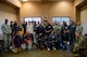 Iron Sharpens Iron Mentoring youth and mentors take a photo together with 432nd Wing volunteers after their mentoring sessions at Creech Air Force Base, Nevada