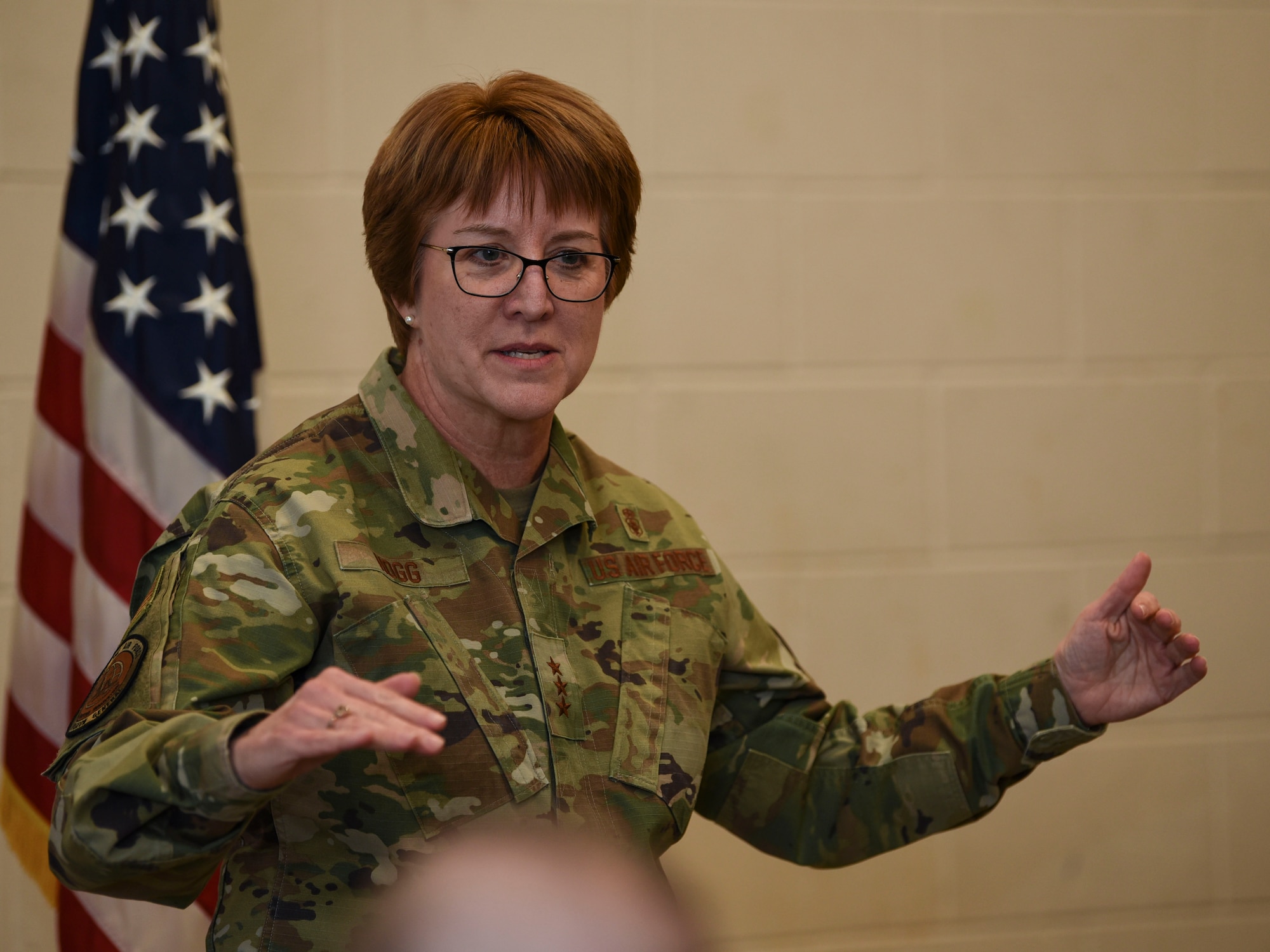 Lt. Gen. Dorothy A. Hogg, Air Force Surgeon General, briefs at an all-call during her visit to Grand Forks Air Force Base, N.D., Jan. 27, 2020. Hogg congratulated 319th Medical Group Airmen on their accomplishments, encouraged them to make suggestions for better procedures and to continuously challenge themselves to become better medical professionals. (U.S. Air Force photo by Senior Airman Melody Howley)