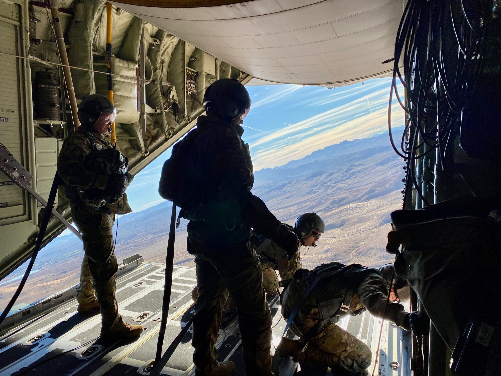 photo of Airmen on HC-130J