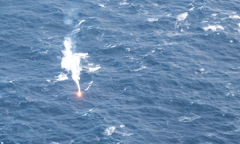 An illumination flare descends from a C-17 Globemaster III from Joint Base Charleston during Air Mobility Command Test and Evaluation Squadron’s assessment of tactics, techniques and procedures for astronaut rescue and recovery efforts Jan. 22, 2020, off the coast of Florida near Patrick Air Force Base.